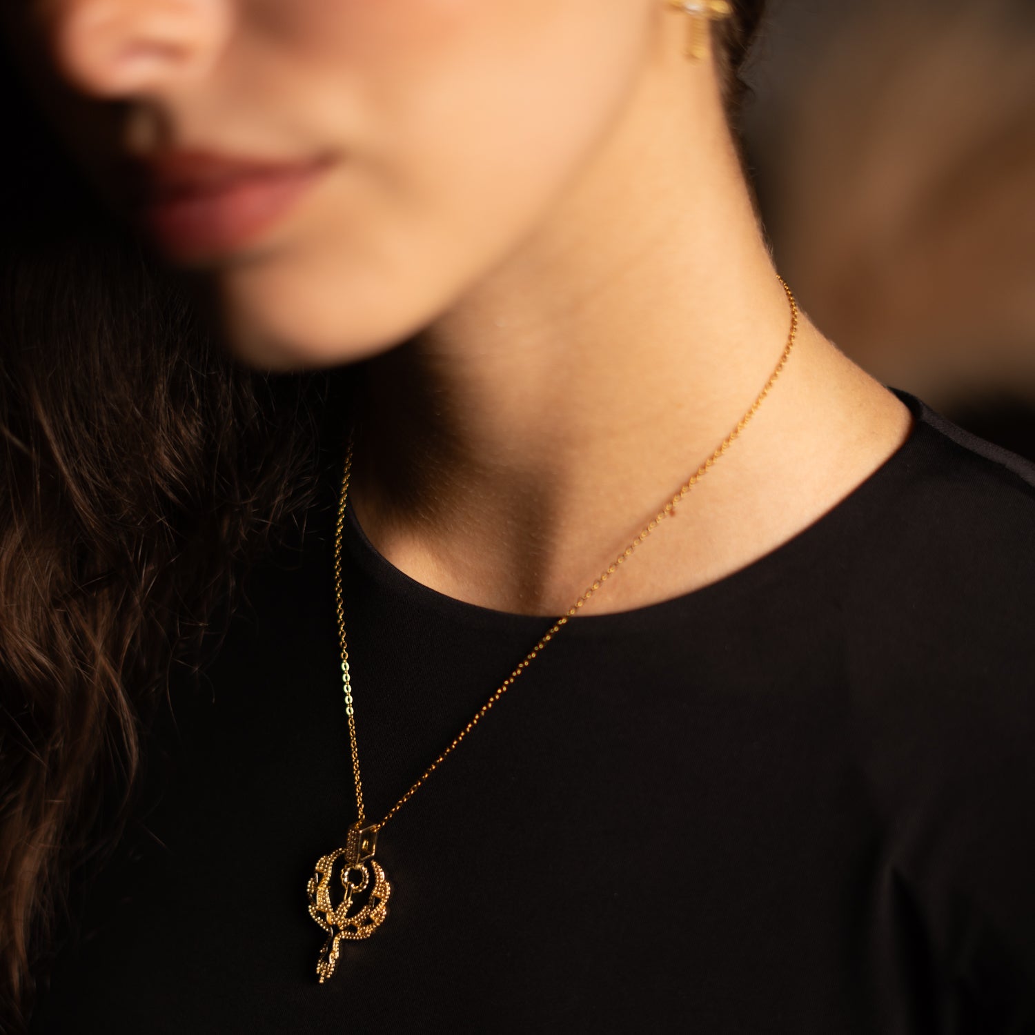 Gold-plated phoenix necklace with sparkling cubic zirconia stones