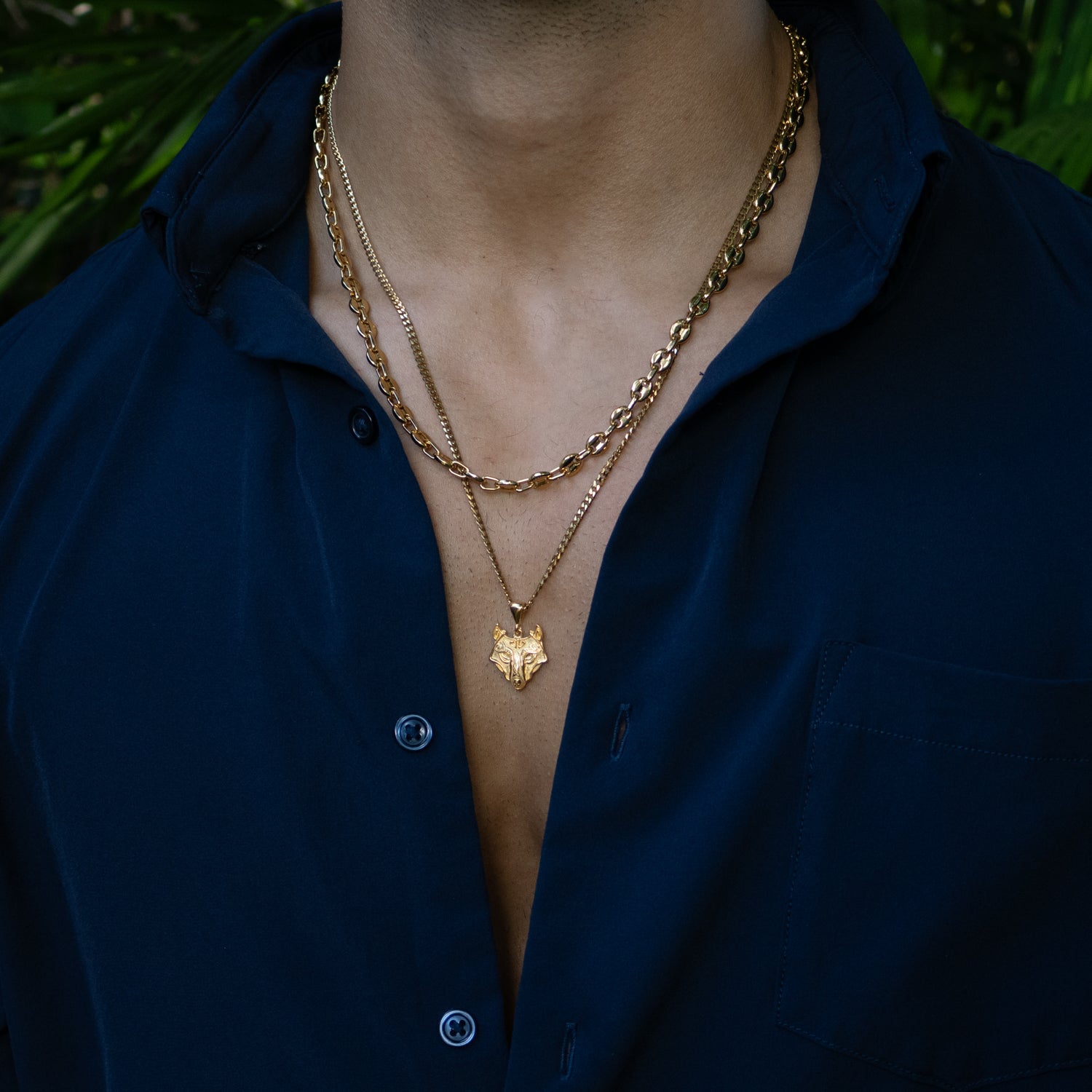 Wolf head pendant necklace crafted in 24k gold-plated sterling silver, featuring intricate fur details and a gold chain.