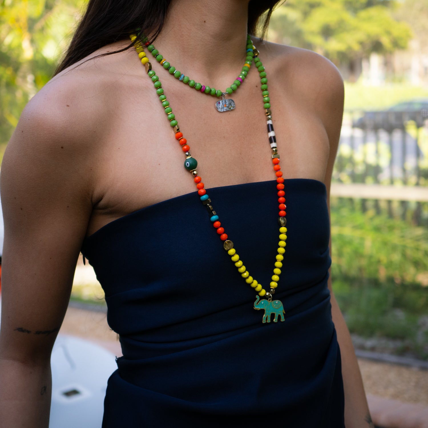 Stylish Necklace with Colorful Beads, Sea Shell, Evil Eye Charms, and Sterling Silver Elephant Pendant