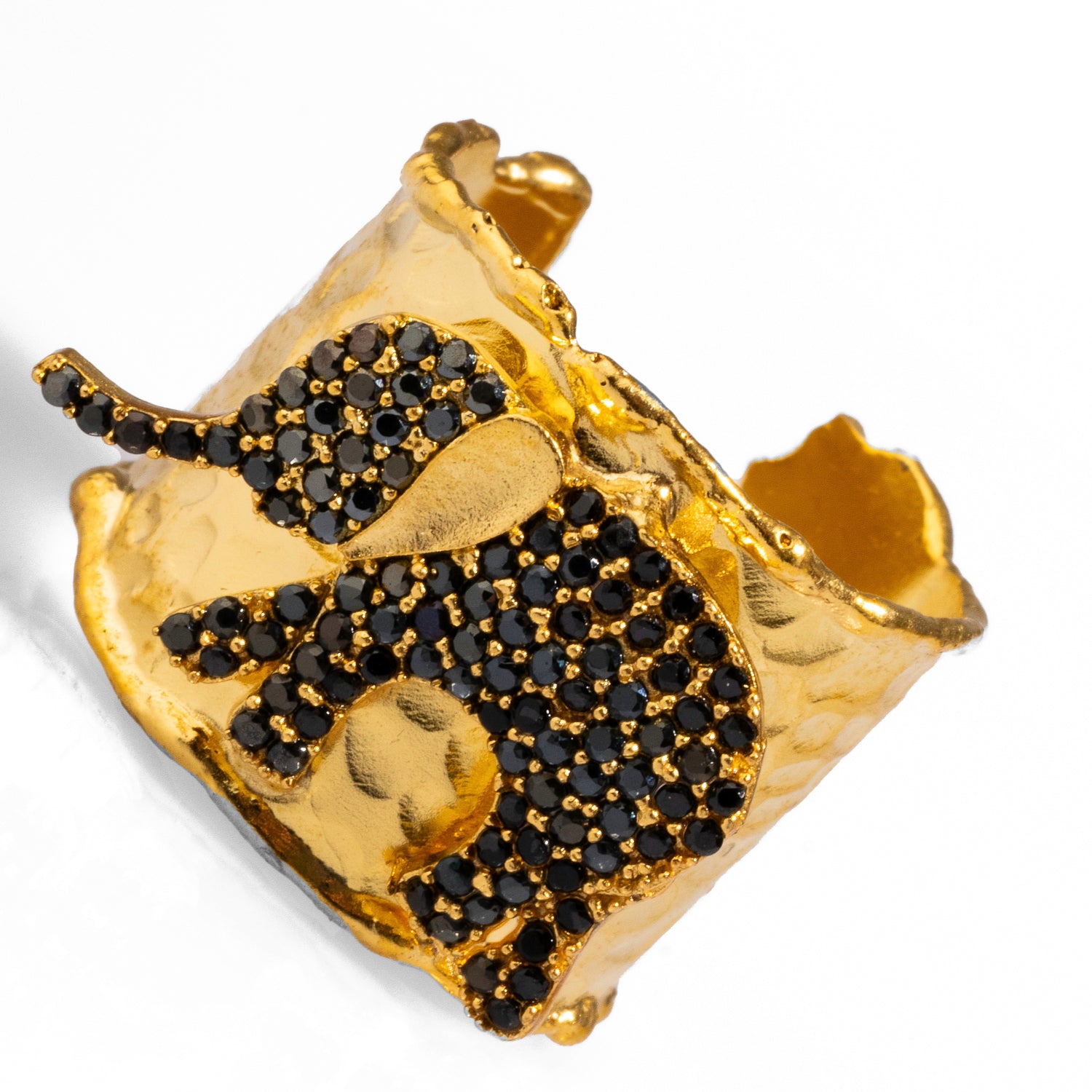 Elegant chunky gold ring with a black crystal elephant design, crafted from 24k gold-plated brass, adjustable for versatile wear.