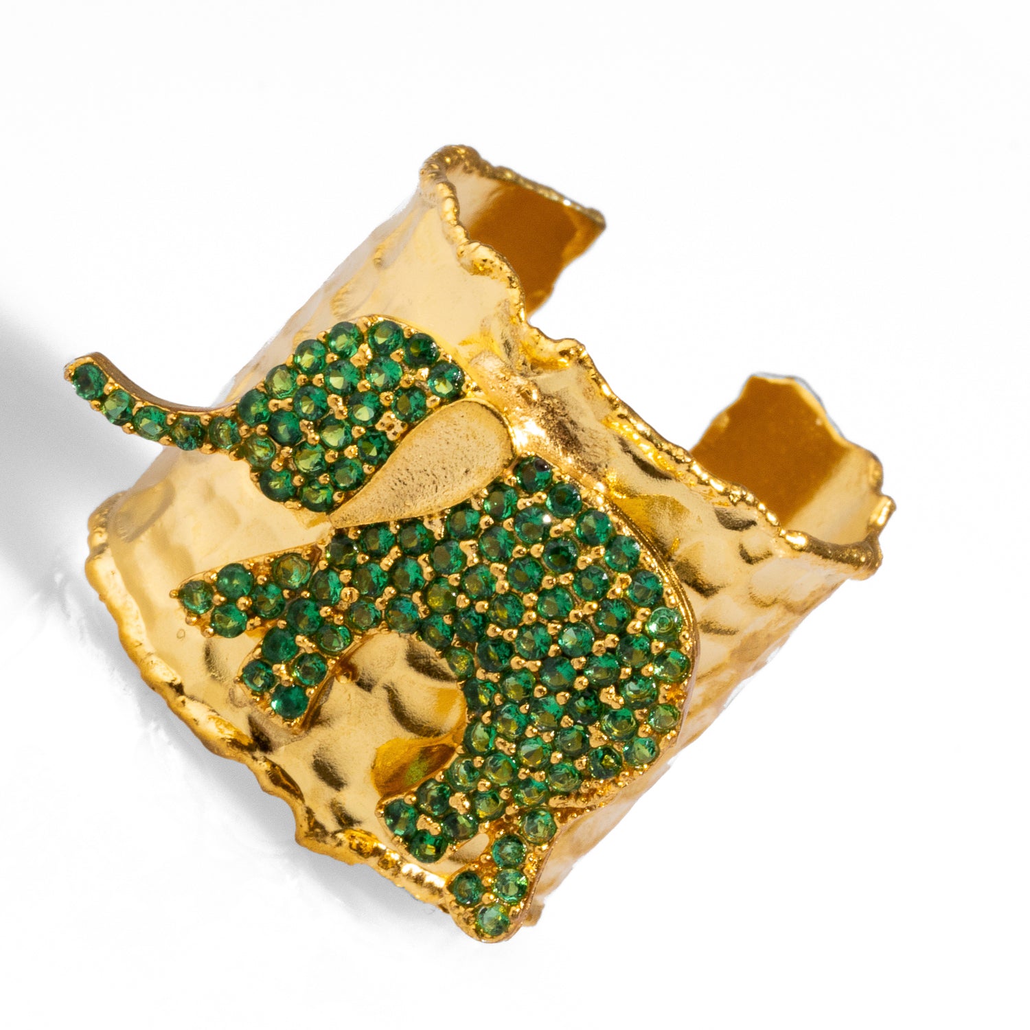 Elegant chunky gold ring with a green crystal elephant design, crafted from 24k gold-plated brass, adjustable for versatile wear.