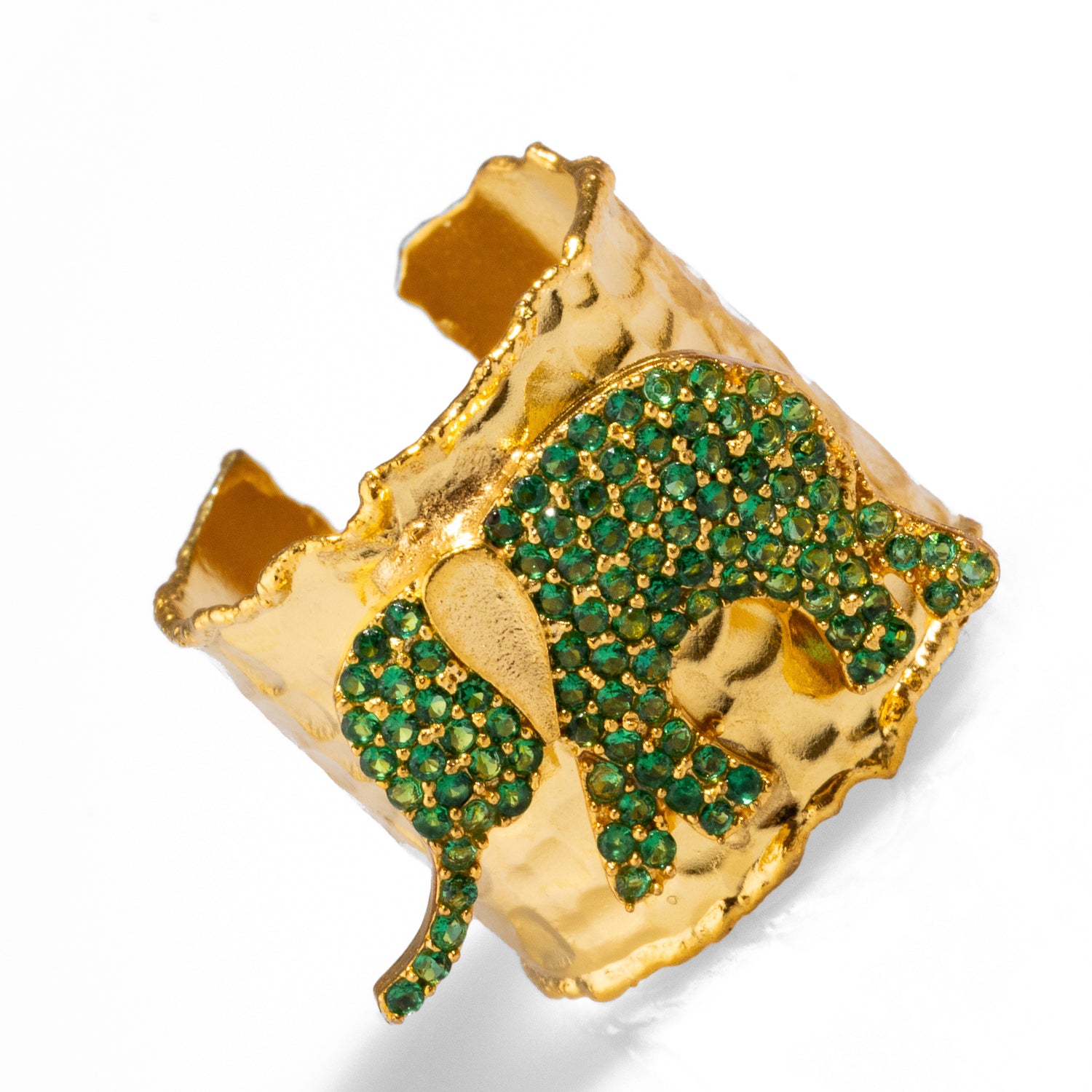 Luxurious 24k gold-plated ring with a green crystal elephant, combining protection and elegance in an adjustable design.