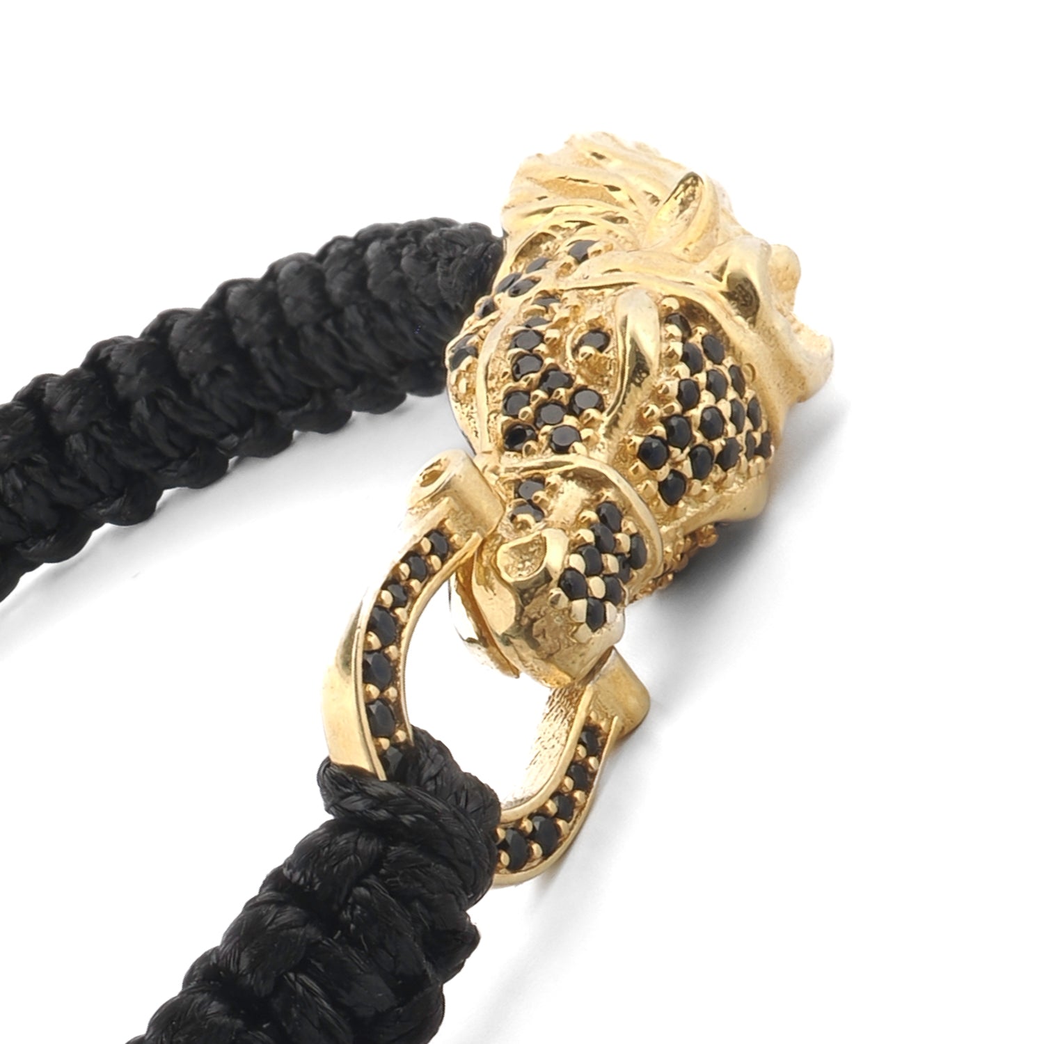 Men’s woven bracelet with black diamond beads and a detailed silver guardian lion charm, bold and artisan-crafted.