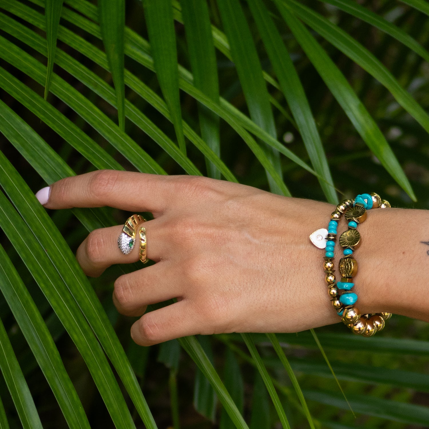 Handcrafted gold snake ring symbolizing protection, transformation, and intuition