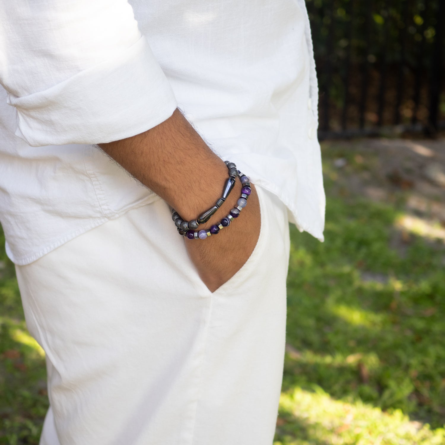 Handmade bracelet featuring 8mm natural faceted hematite stones and elegant teardrop hematite.