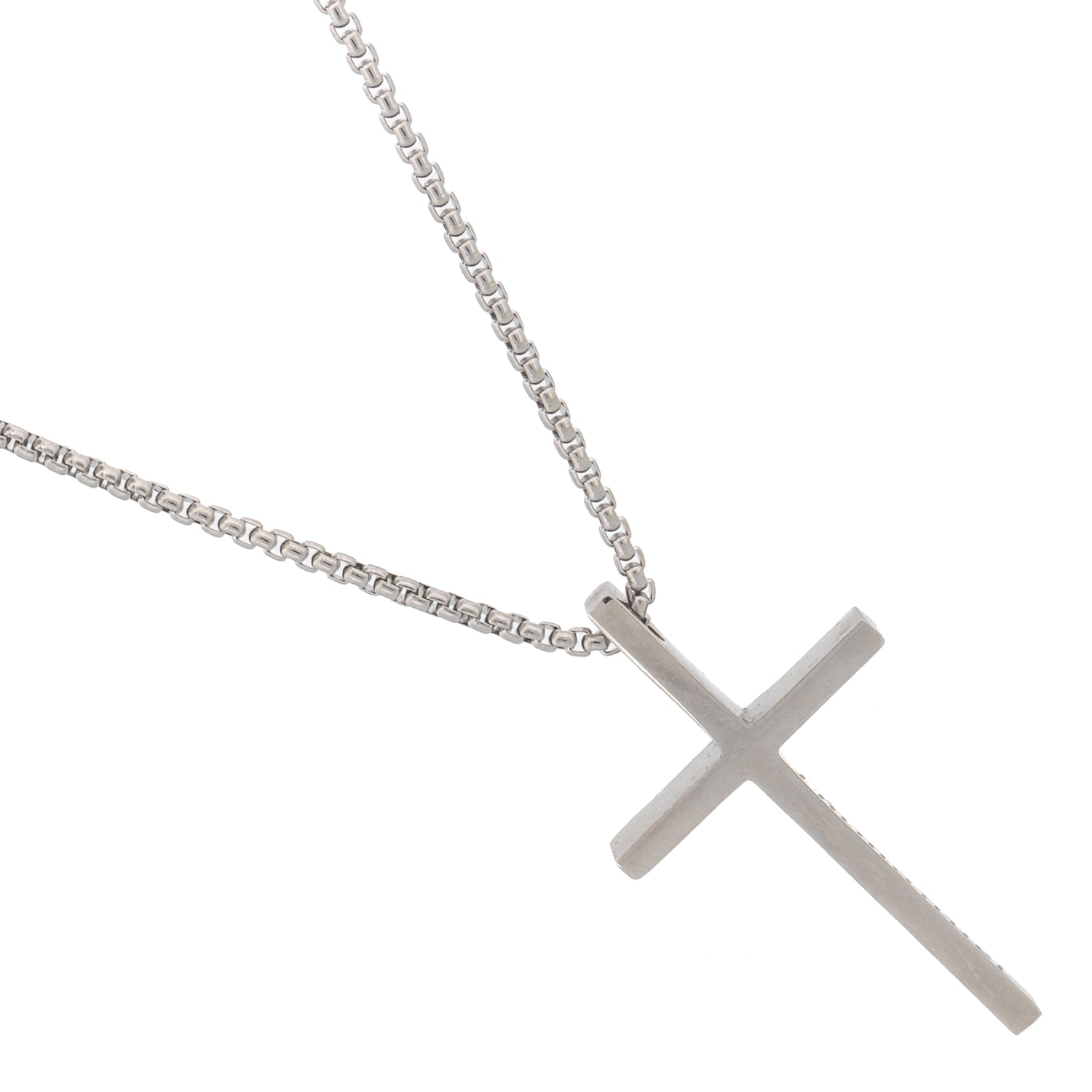 Close-up of engraved “Immanuel” cross pendant on hypoallergenic silver chain.