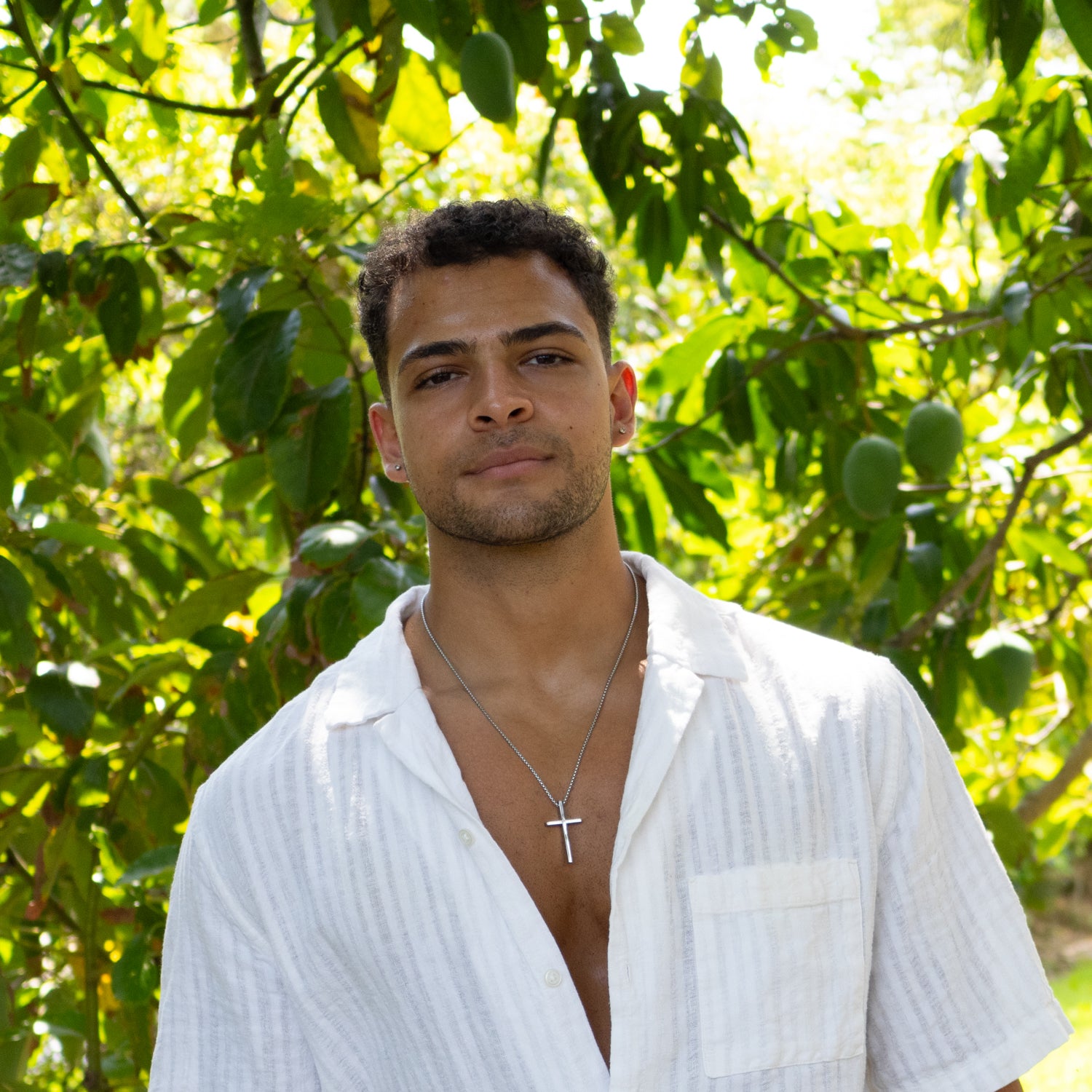 Durable men’s necklace with silver cross pendant and spiritual meaning.