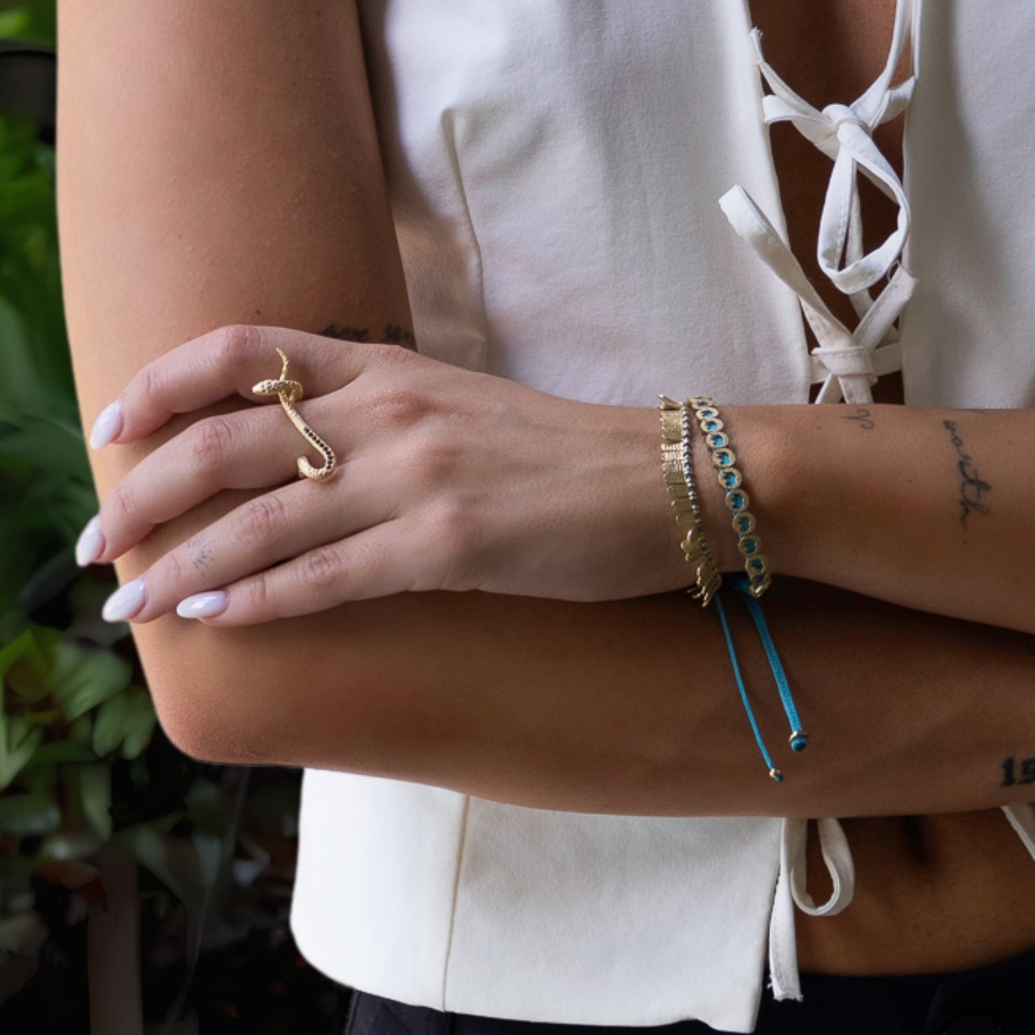 Adjustable Turquoise Bracelet with Gold Elephant Charms Symbolizing Strength and Luck