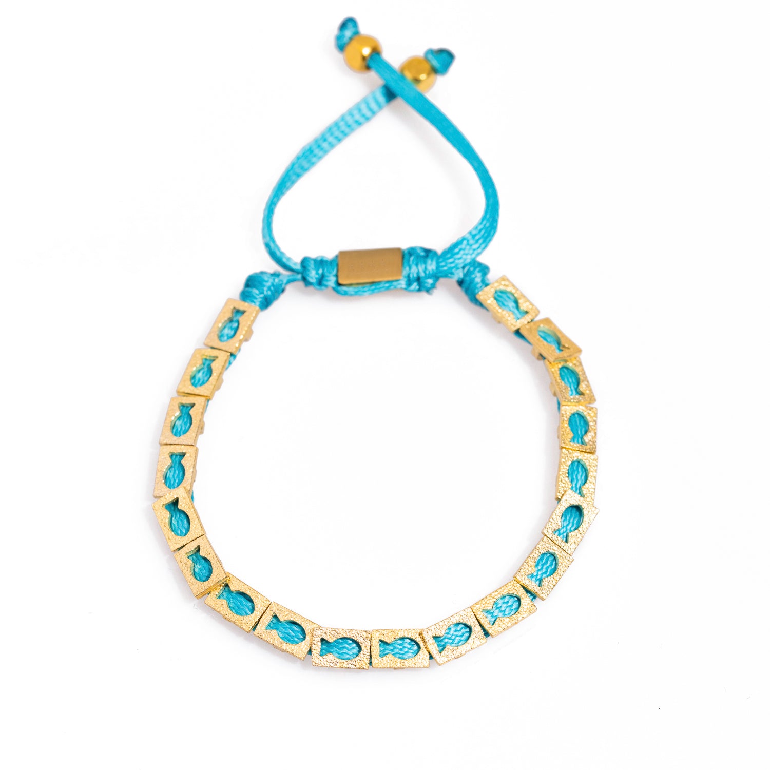 Turquoise woven string bracelet featuring 18k gold-plated brass fish charms for good fortune.