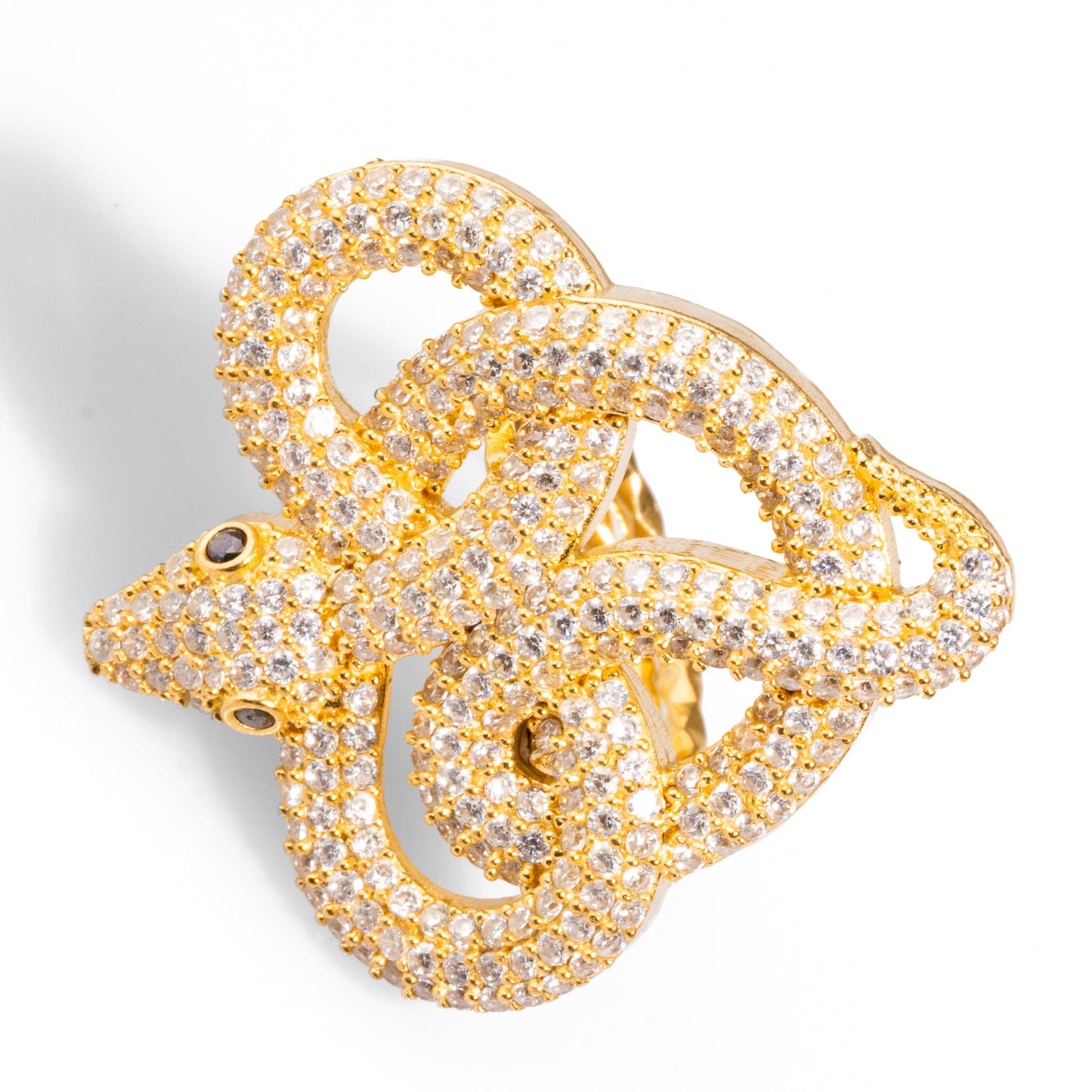 Captivating snake-shaped ring with CZ diamonds and green eyes, made from 24k gold-plated brass, featuring a chunky design and adjustable band.
