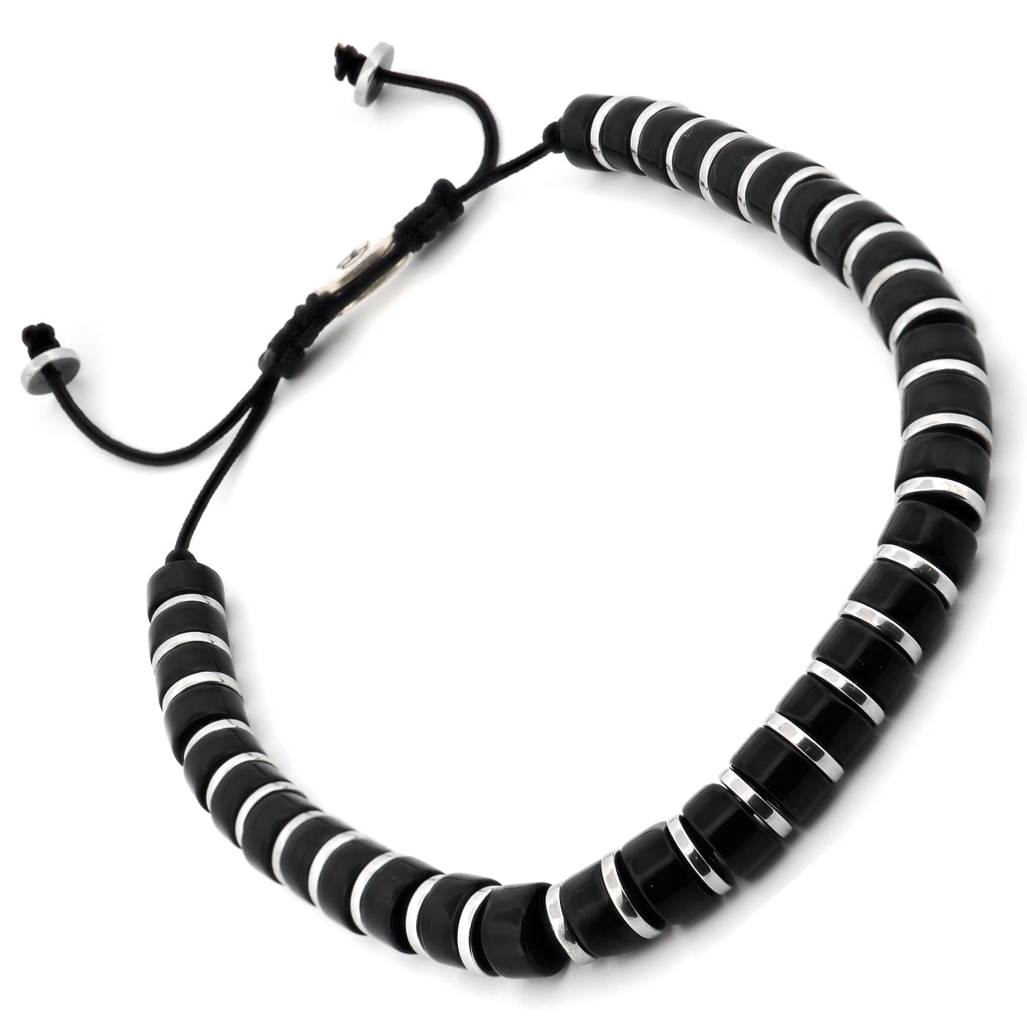 Interspersed between the onyx stones are sleek silver hematite stone spacers, adding a touch of sophistication and contrast to the bracelet's design.