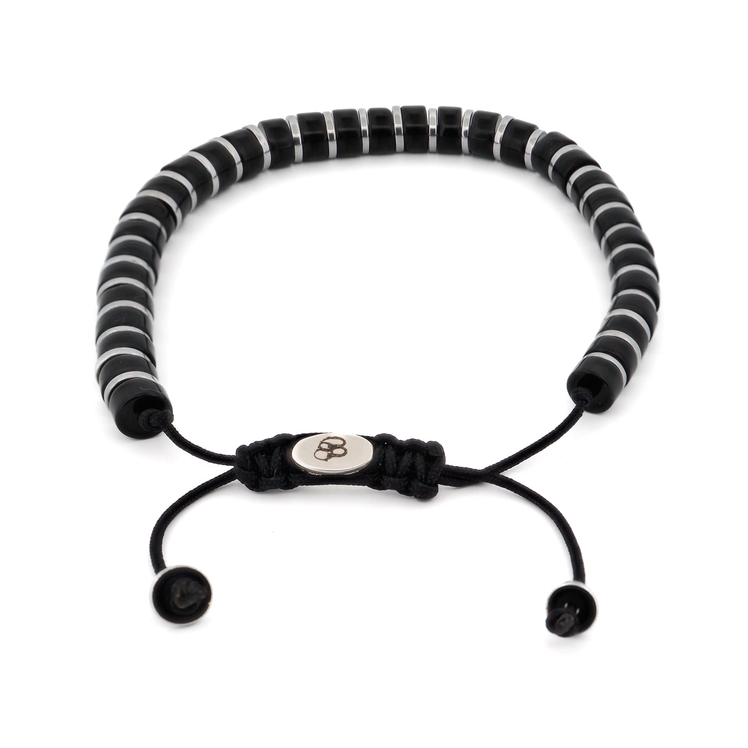 Unique men's bracelet featuring black onyx nuggets and silver hematite spacers, handmade for timeless appeal.