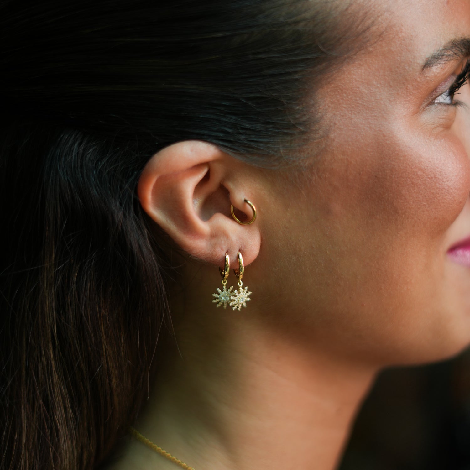 Delicate Gold Earrings with a Sun Charm and Sparkling CZ Diamonds