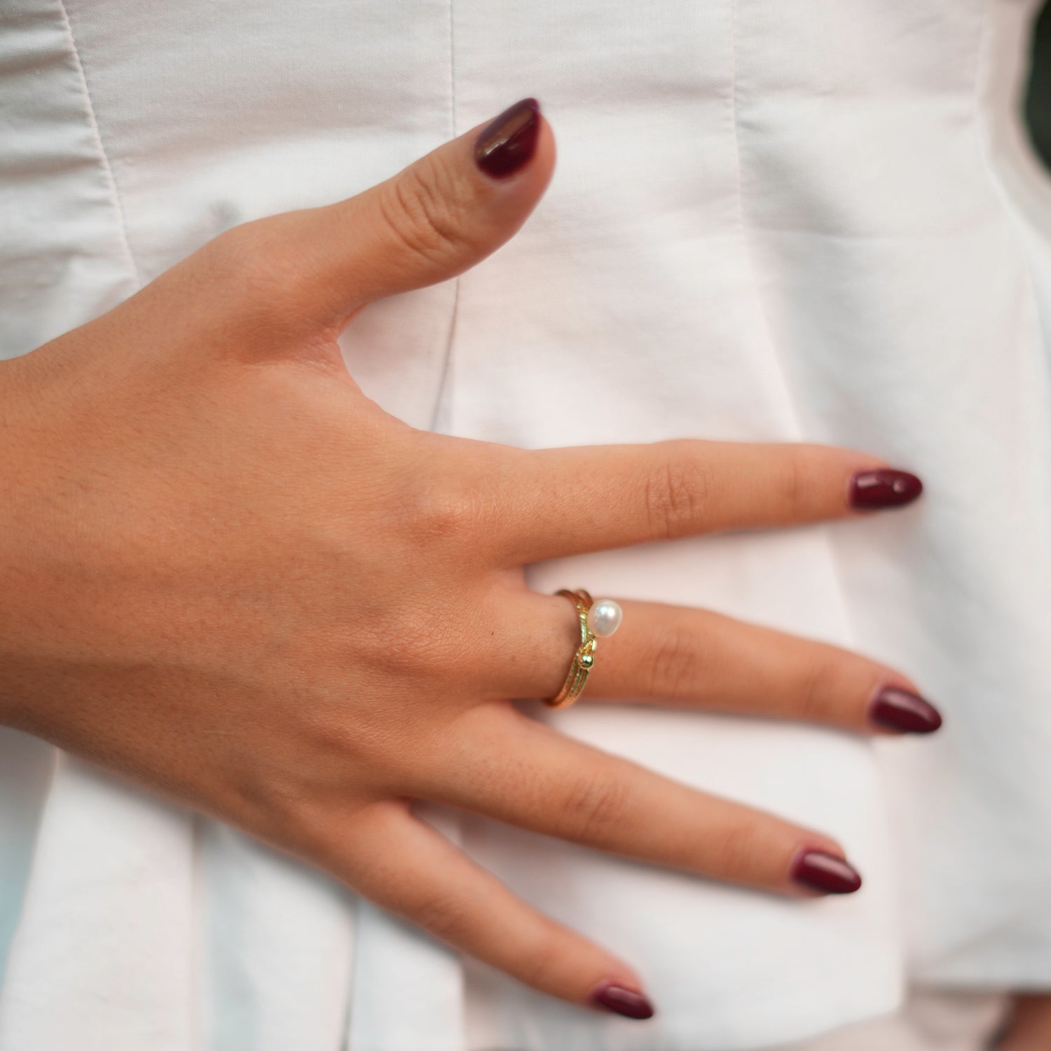 Sleek Gold Cocktail Ring with Floating Pearl and Adjustable Size for Perfect Fit