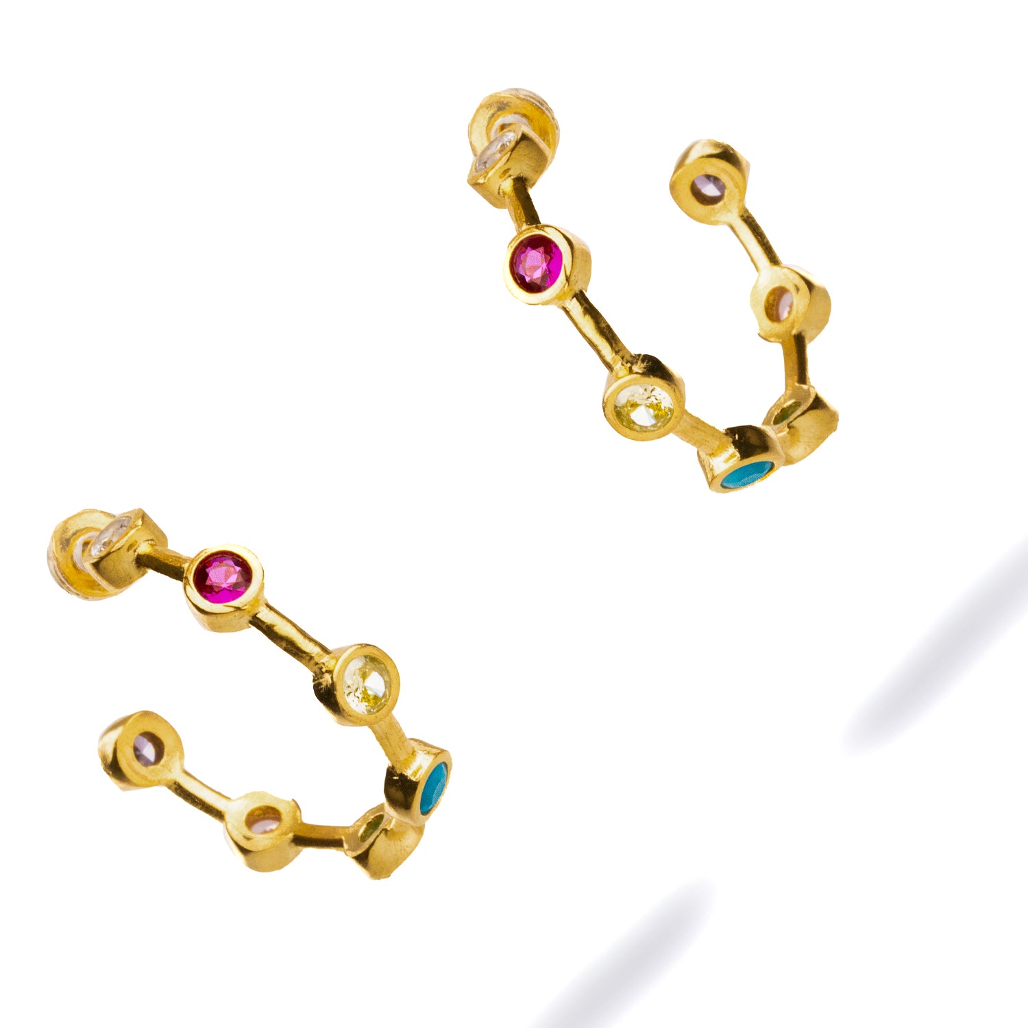 Chic gold hoop earrings featuring a playful arrangement of turquoise, ruby, emerald, and quartz stones, perfect for any occasion.
