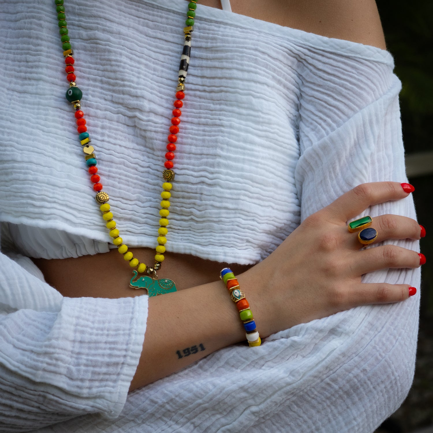 Stretch bracelet with multicolor beads and sparkling zircon accents for everyday protection