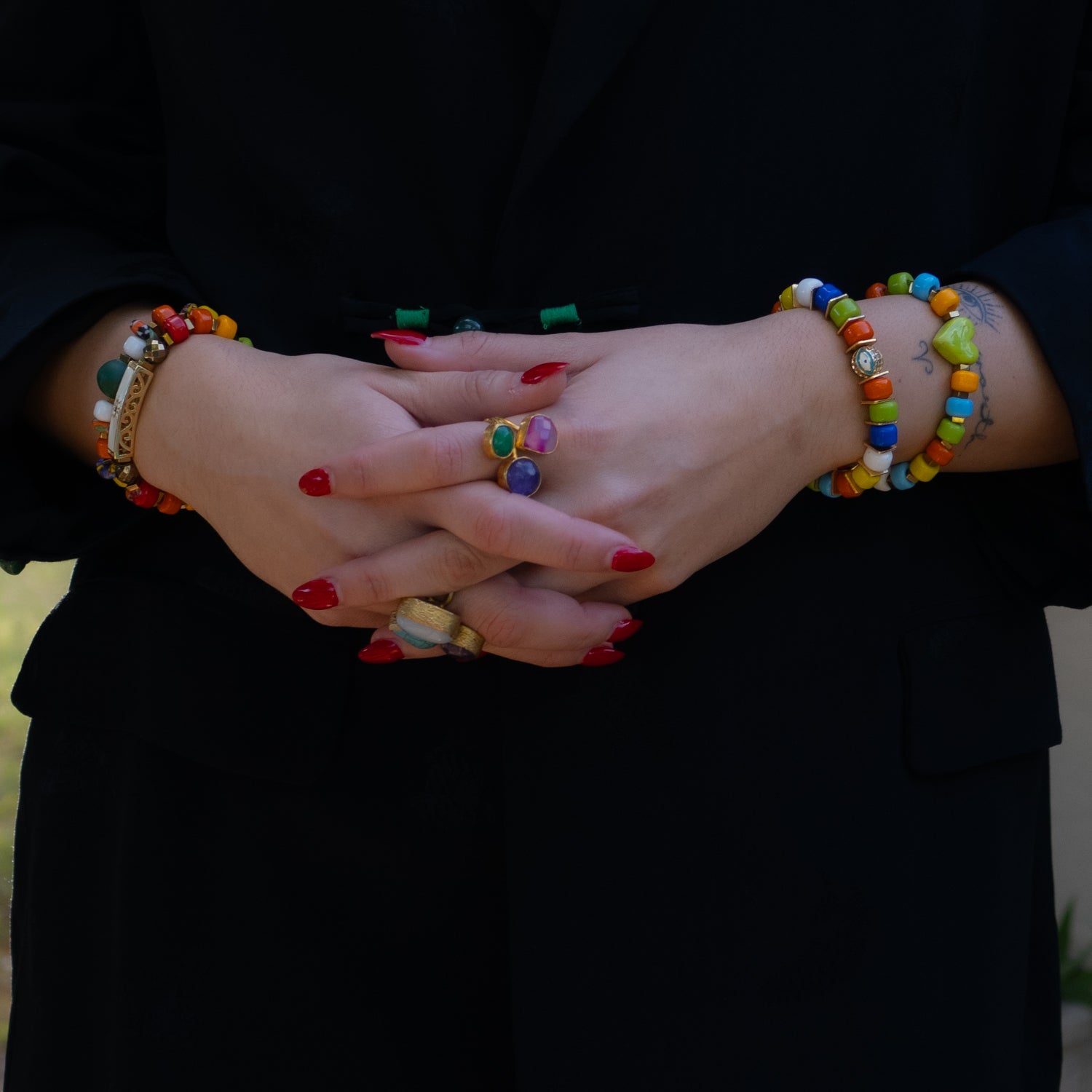 Spiritual protection bracelet with gold details and multicolor beading