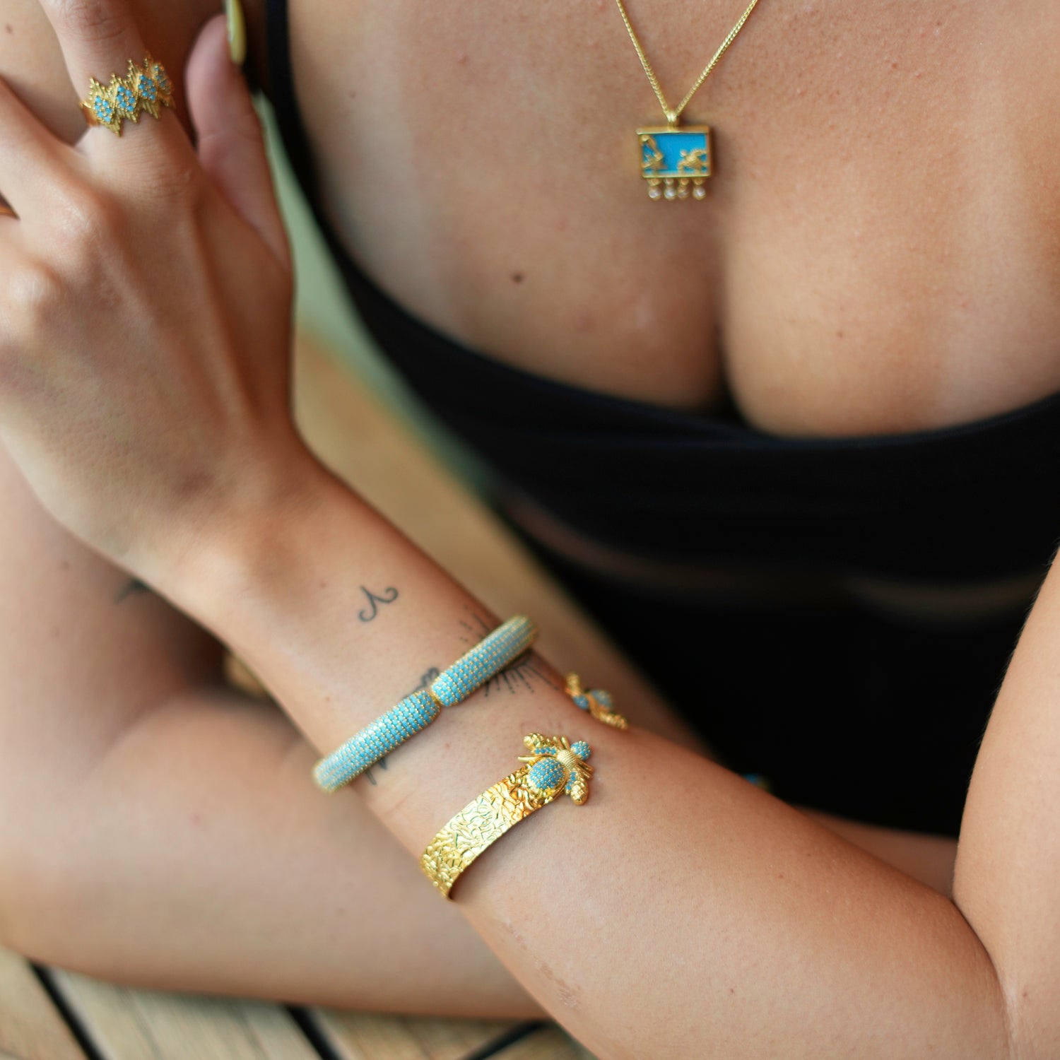 Gold Honey Bee Bracelet with Turquoise Stones for a Bold and Meaningful Accessory