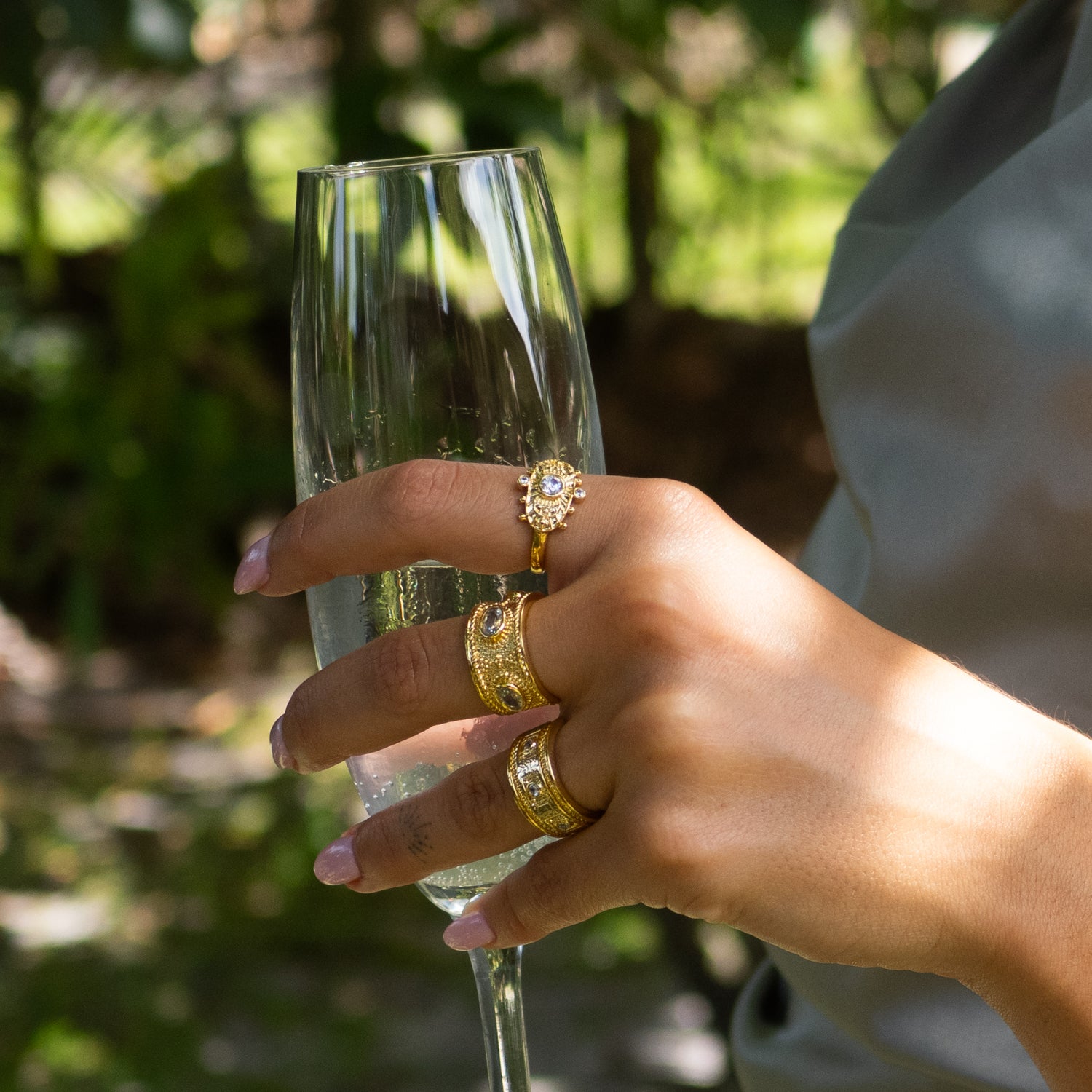 Handcrafted gold ring with five Cz diamonds symbolizing clarity and timeless elegance.