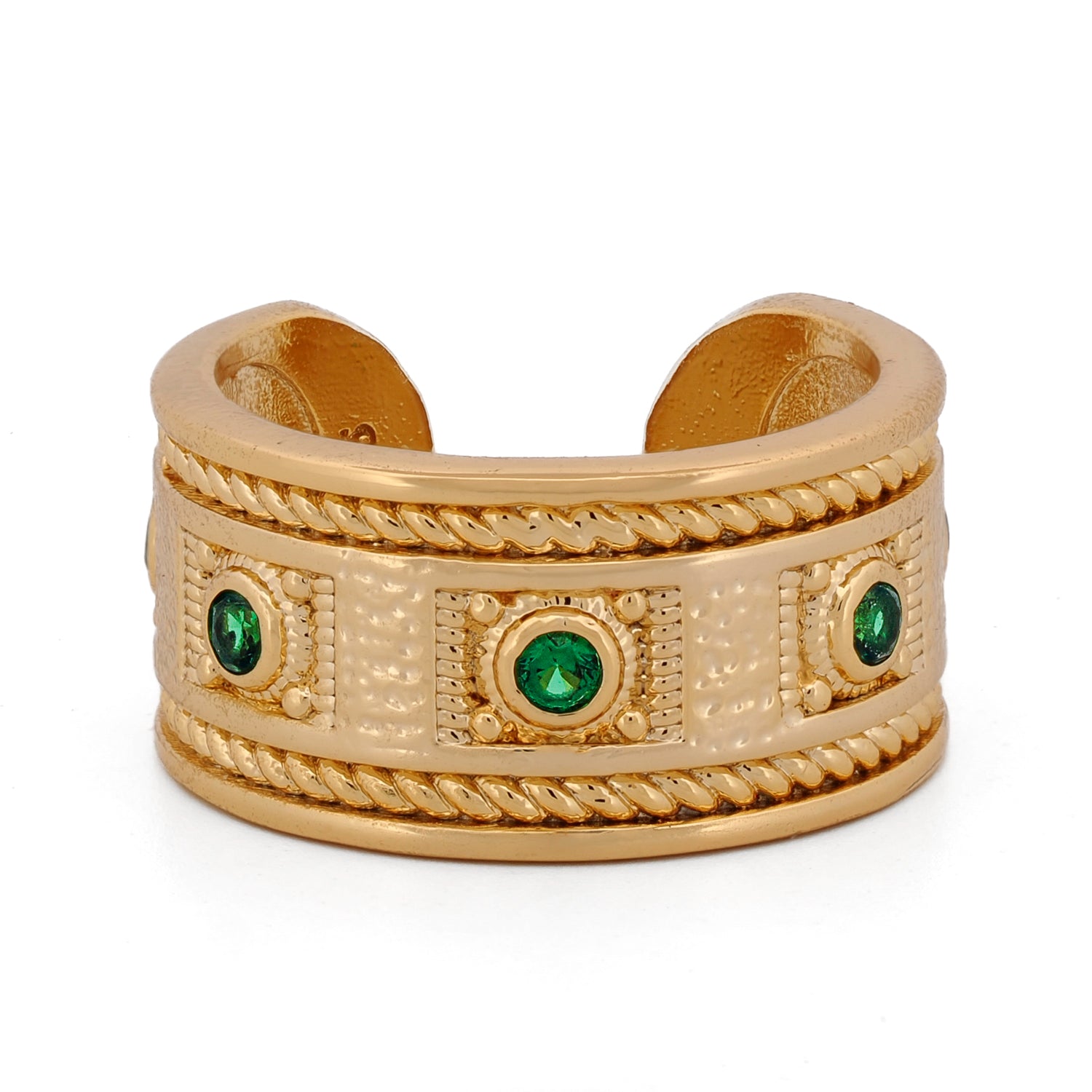 Mystic Queen gold cuff ring adorned with vivid emerald stones and mystical engraved center.