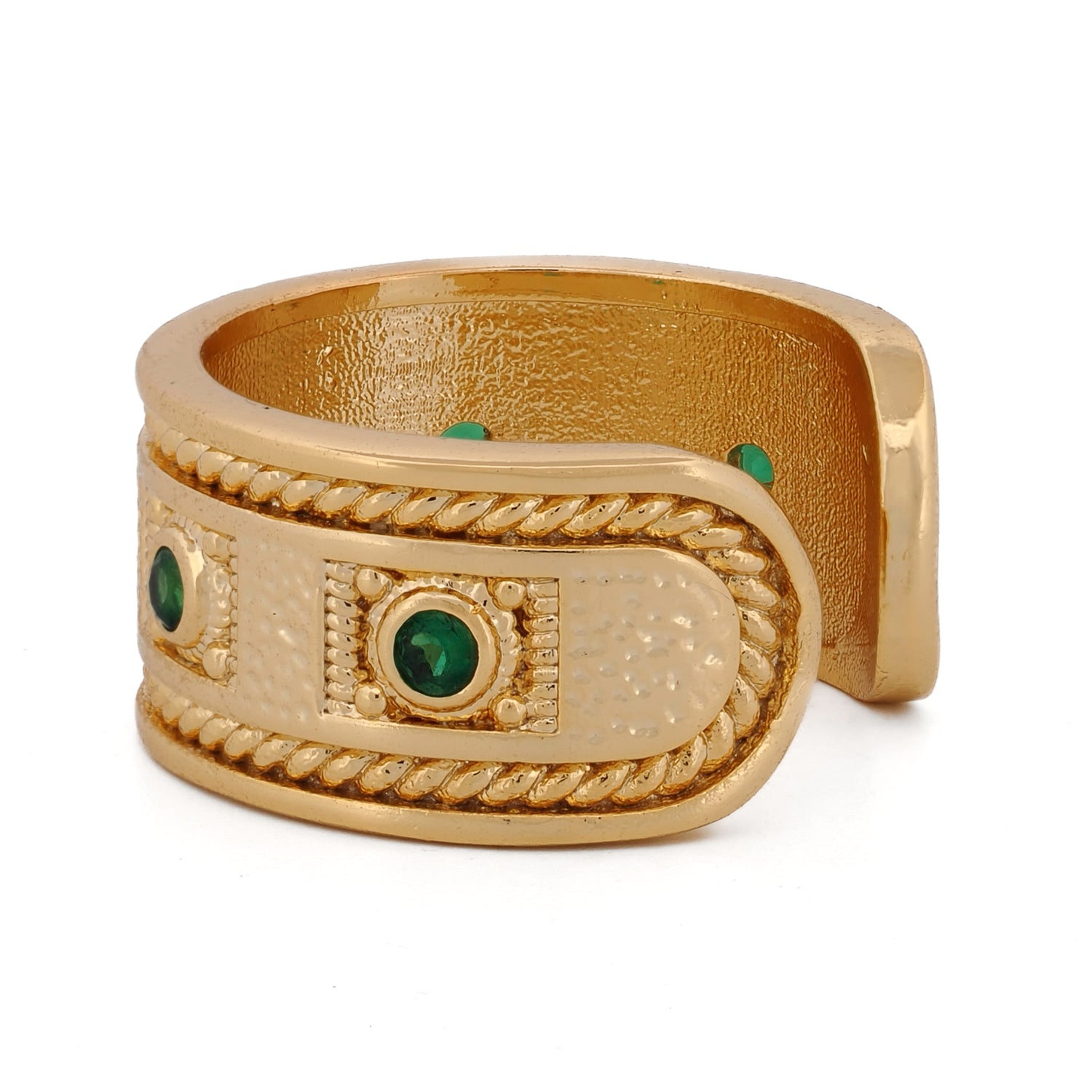 Adjustable gold cuff ring from Cleopatra Collection with emerald stones and ancient motifs.