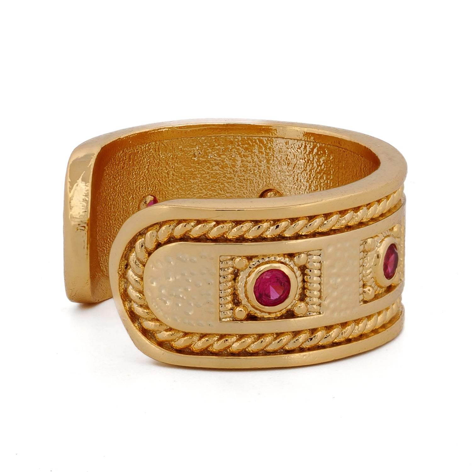 Adjustable gold cuff ring from Cleopatra Collection with ruby stones and ancient motifs.