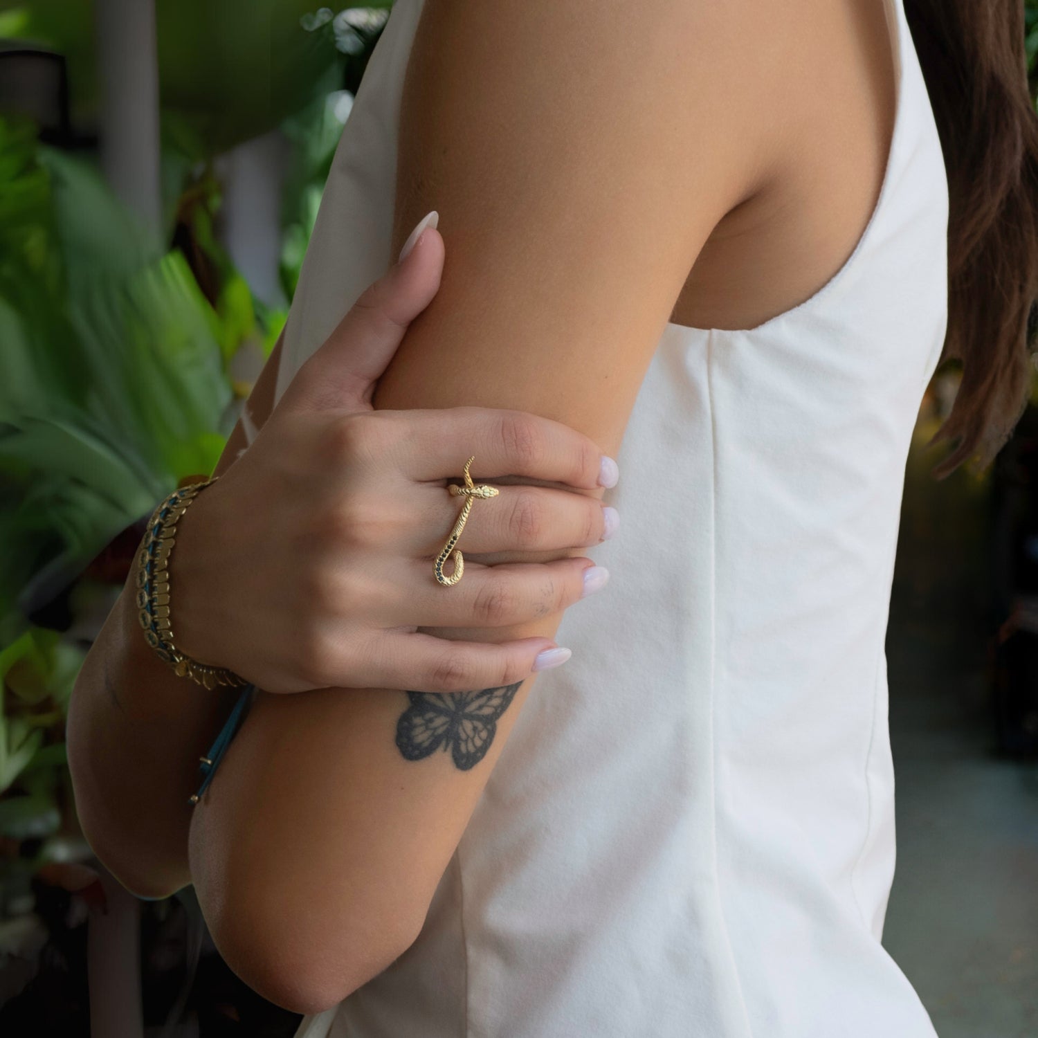 Gold vermeil snake ring featuring intricate details and Cz black diamonds for a luxurious, symbolic touch.