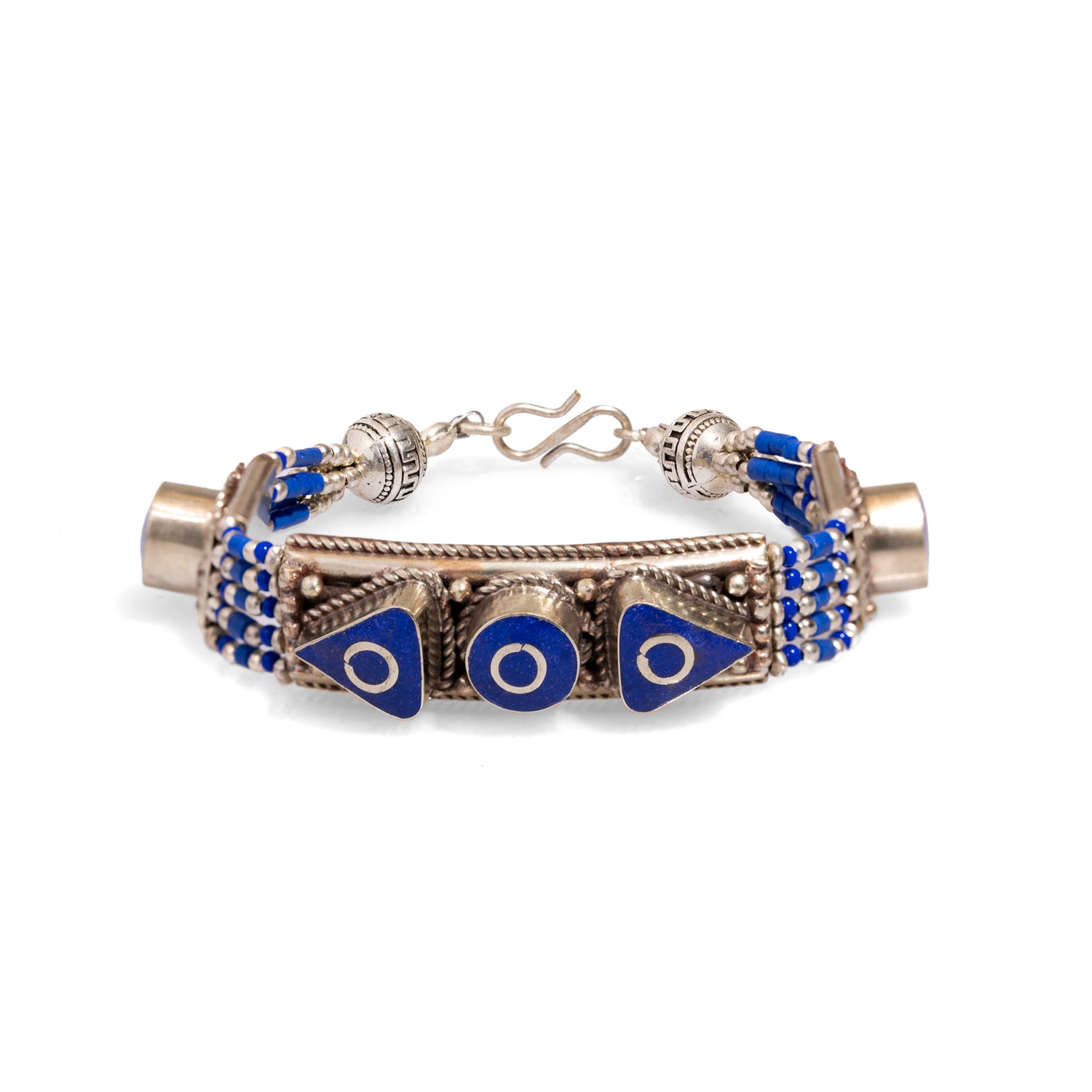 6.5-inch handmade silver bracelet with lapis lazuli inlays and intricate Nepalese design elements.