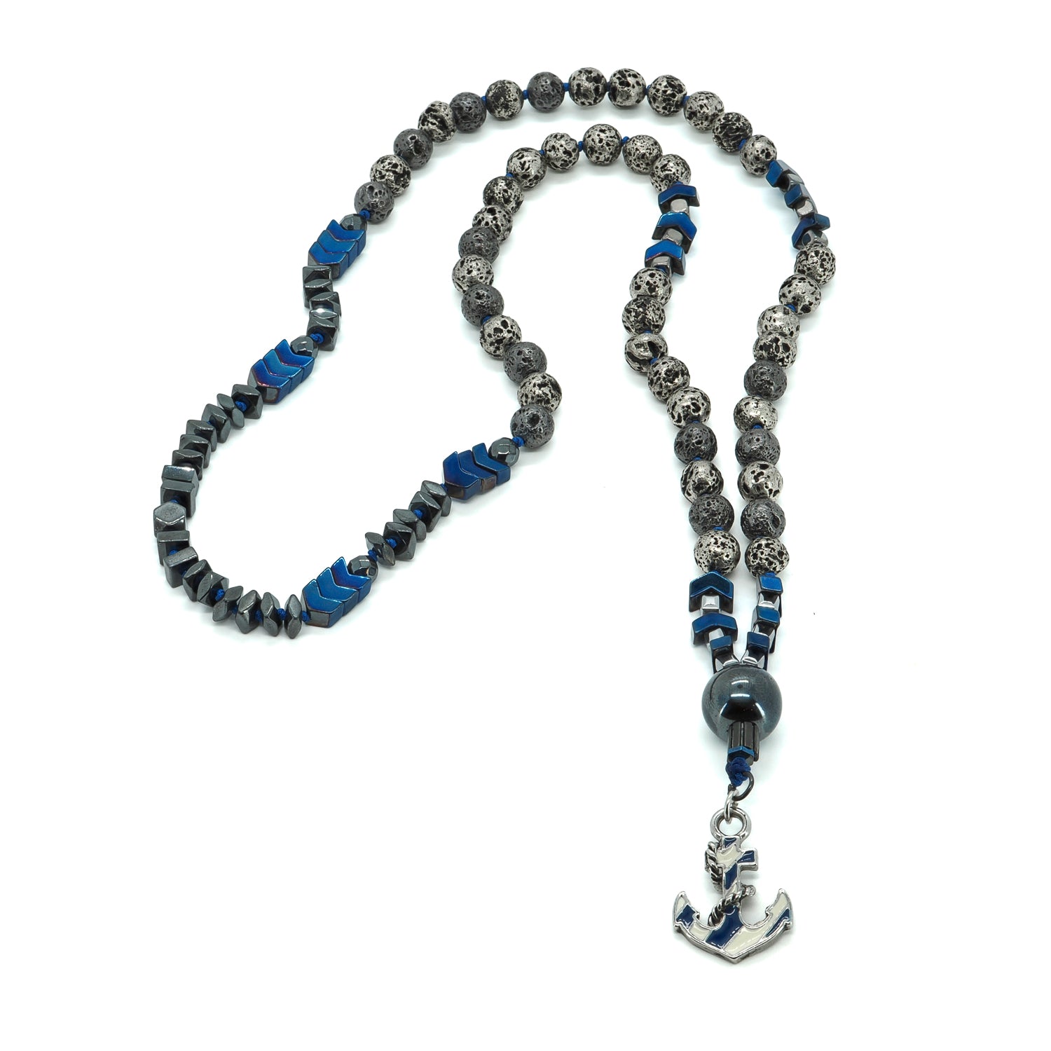 Close-up of enamel-detailed steel anchor pendant on beaded necklace with lava and hematite.