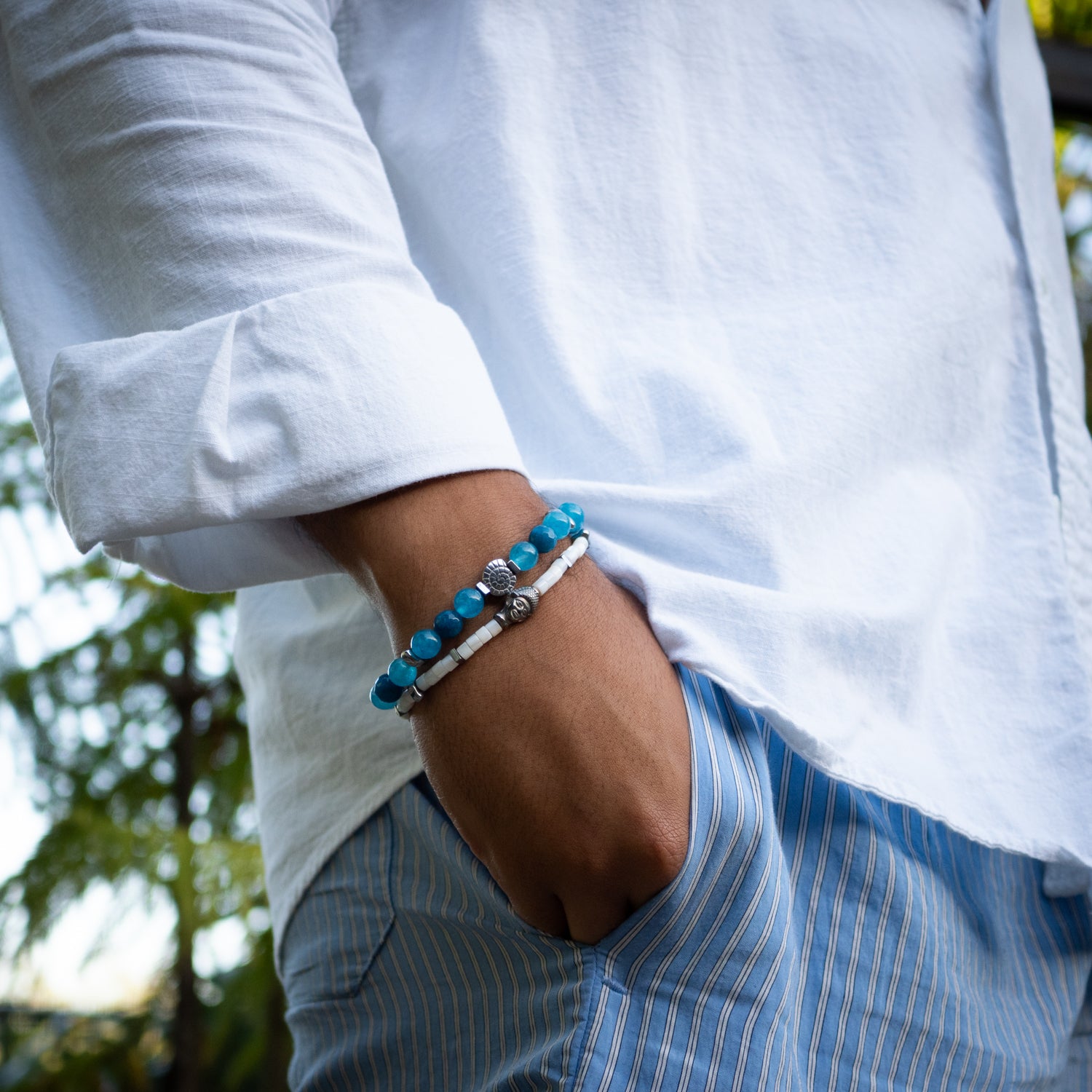 Handmade men’s bracelet set with calming blue jade beads and luminous white pearls.