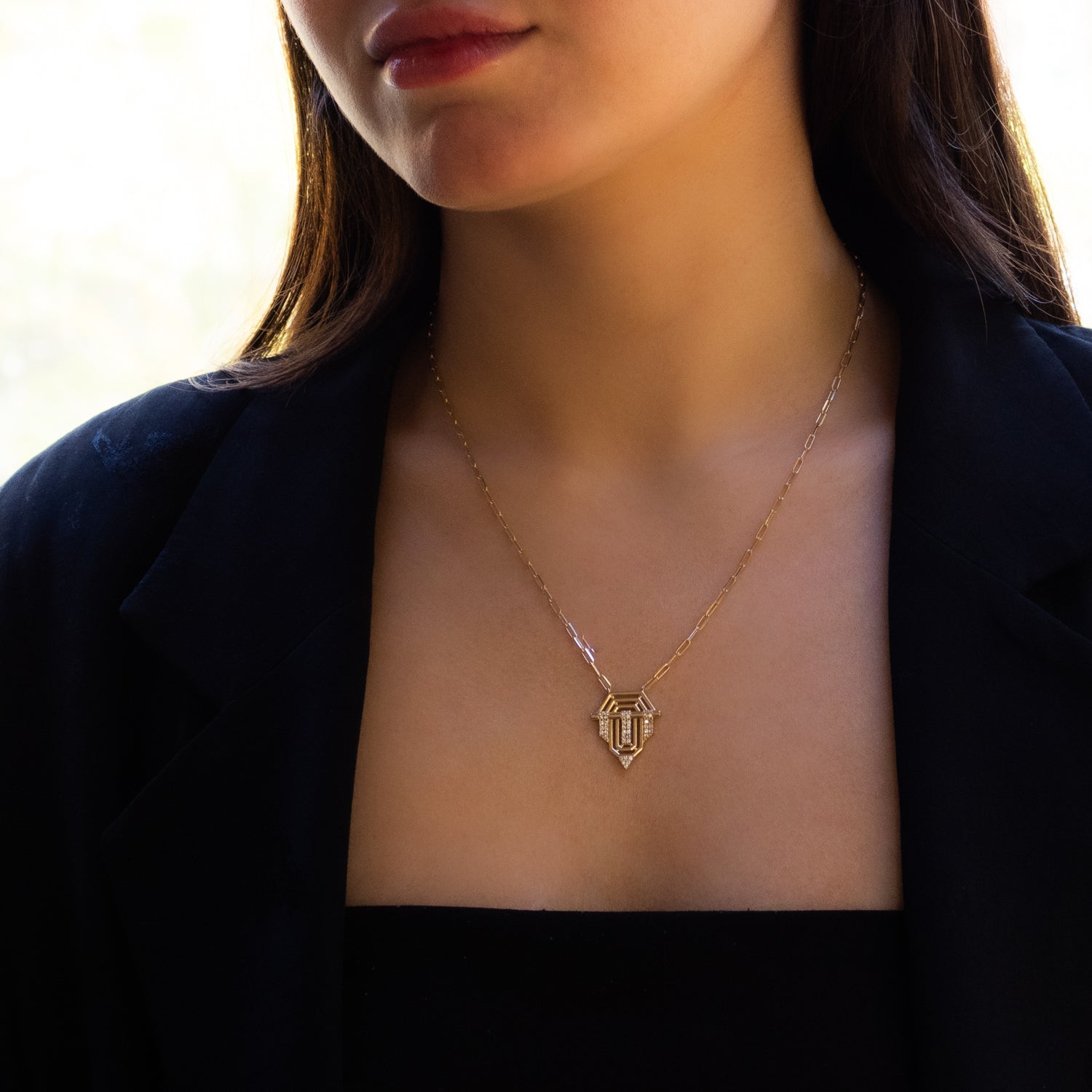Princess Radiance gold medallion pendant on a sleek gold chain