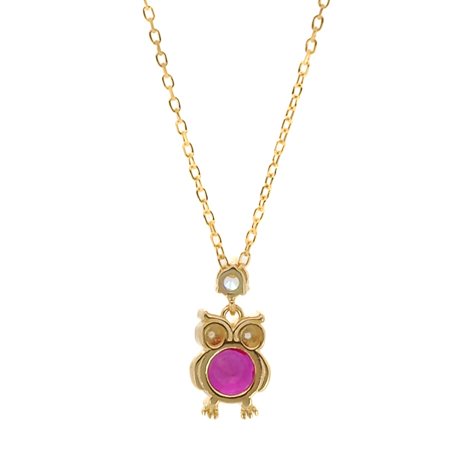 The Ruby Owl Necklace, featuring a dainty owl pendant adorned with a brilliant ruby stone and CZ diamond accents, on an 18K gold-plated sterling silver chain.