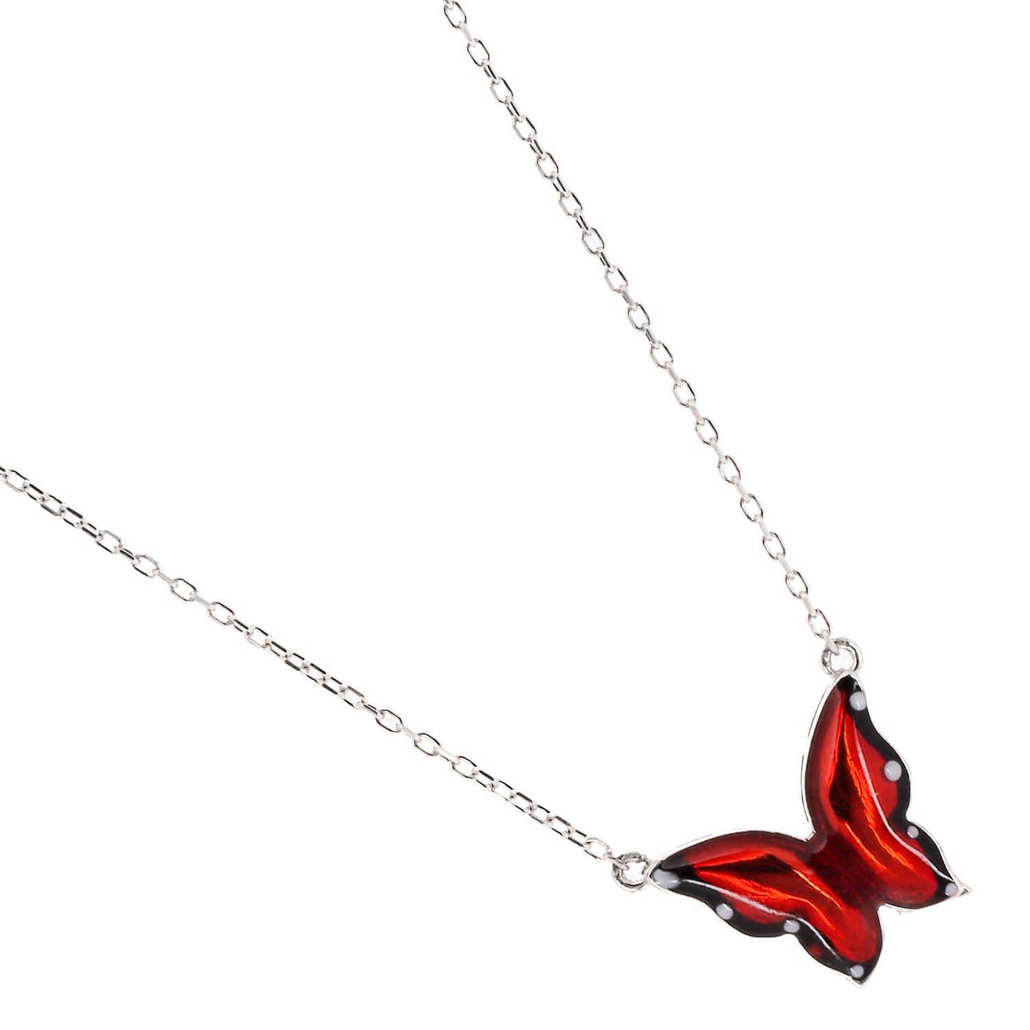 Stylish shot of the Silver Joy Red Enamel Butterfly Necklace, adding a touch of spirituality and elegance to any outfit.