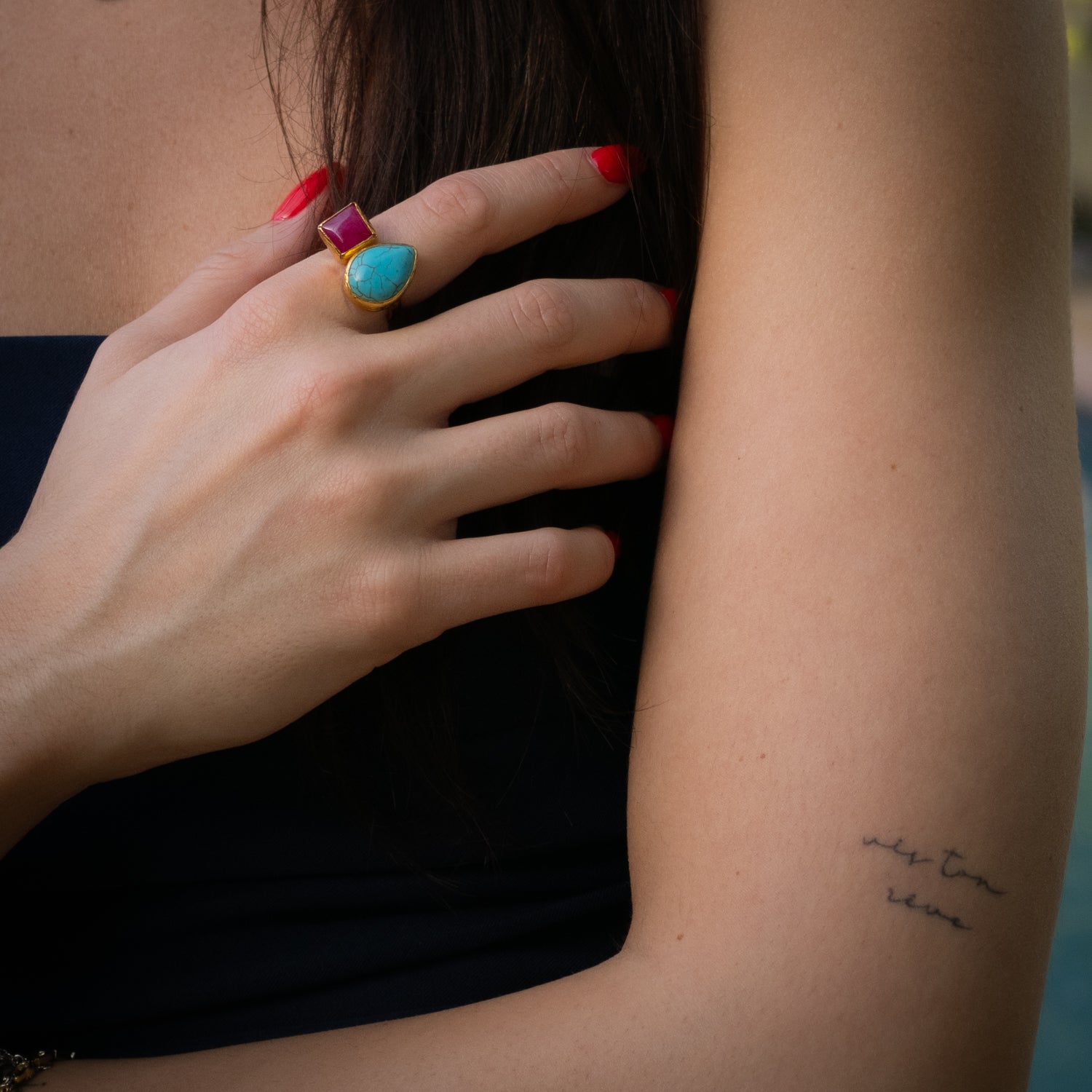 Gold-plated dual stone ring with turquoise and ruby for protection and passion