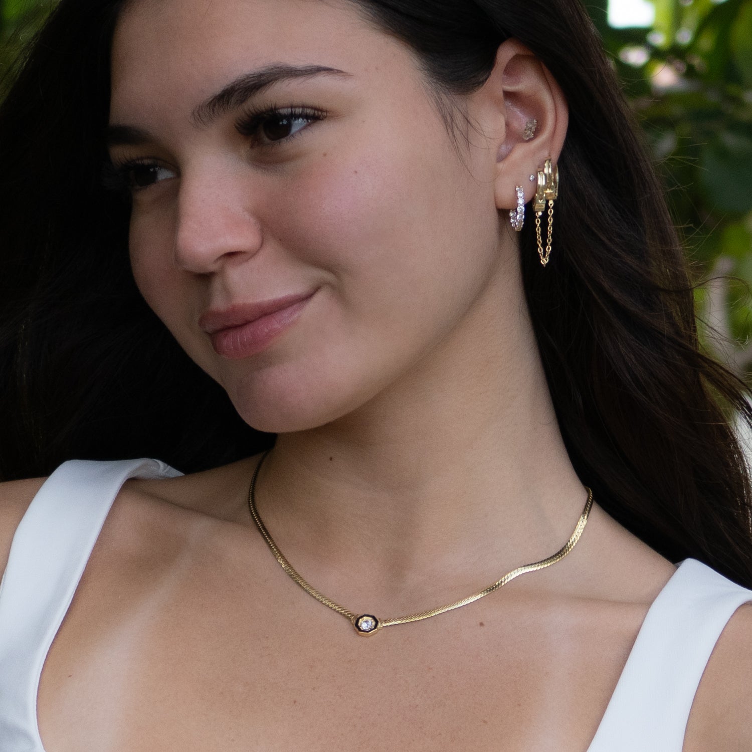 Close-up of radiant gold choker necklace symbolizing inner light and spiritual grace