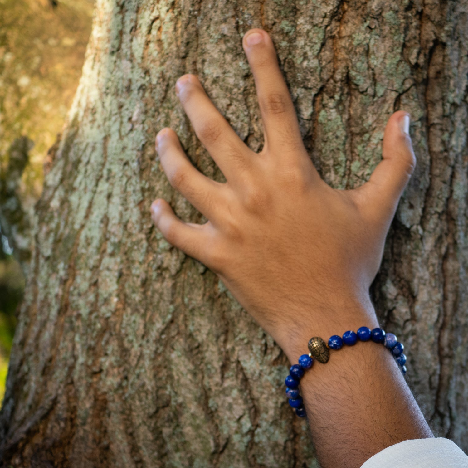 Unique men's bracelet featuring 8mm natural blue jasper stones and playful Spider Man bead.