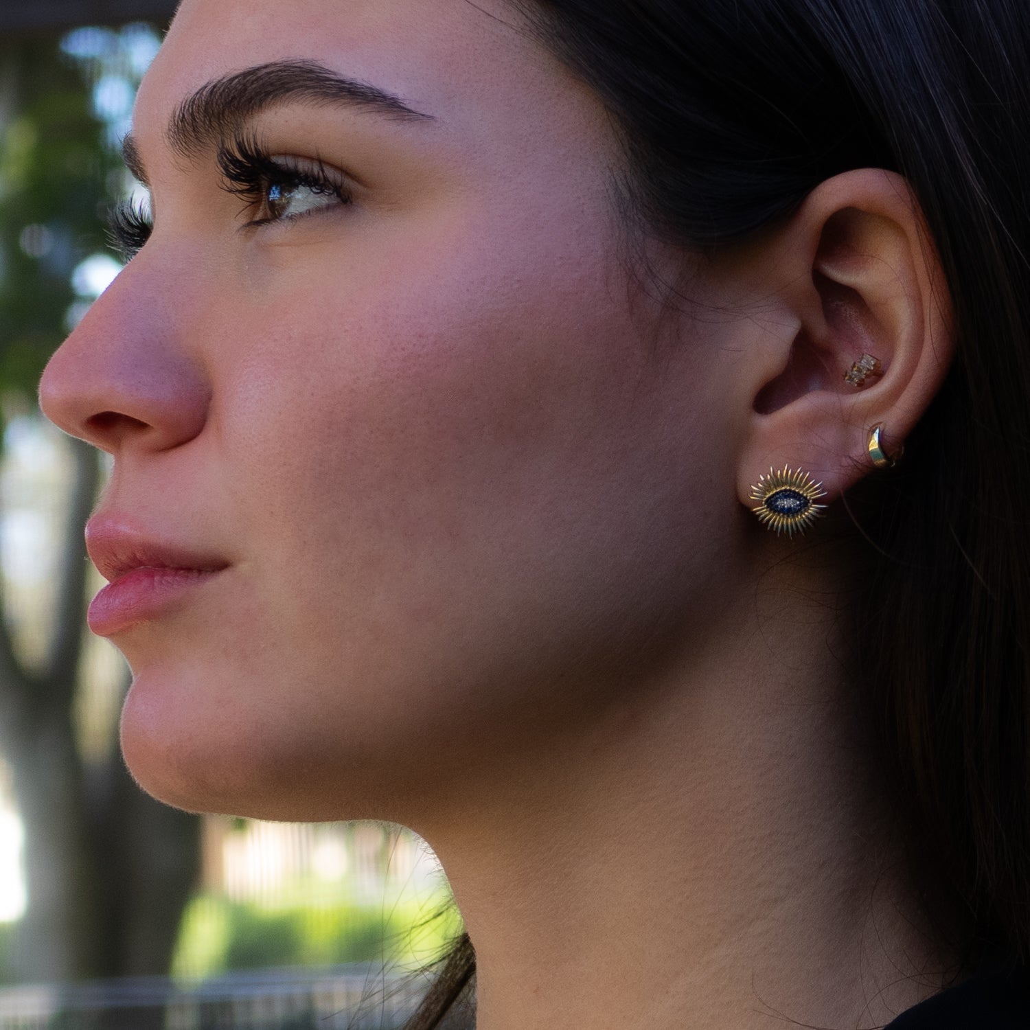 Spiritual Guardian stud earrings featuring diamond and sapphire