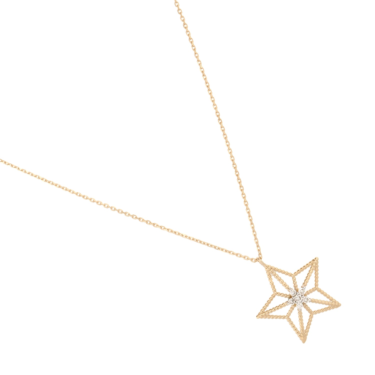 Celestial star-shaped 14K gold necklace with sparkling diamond centerpiece