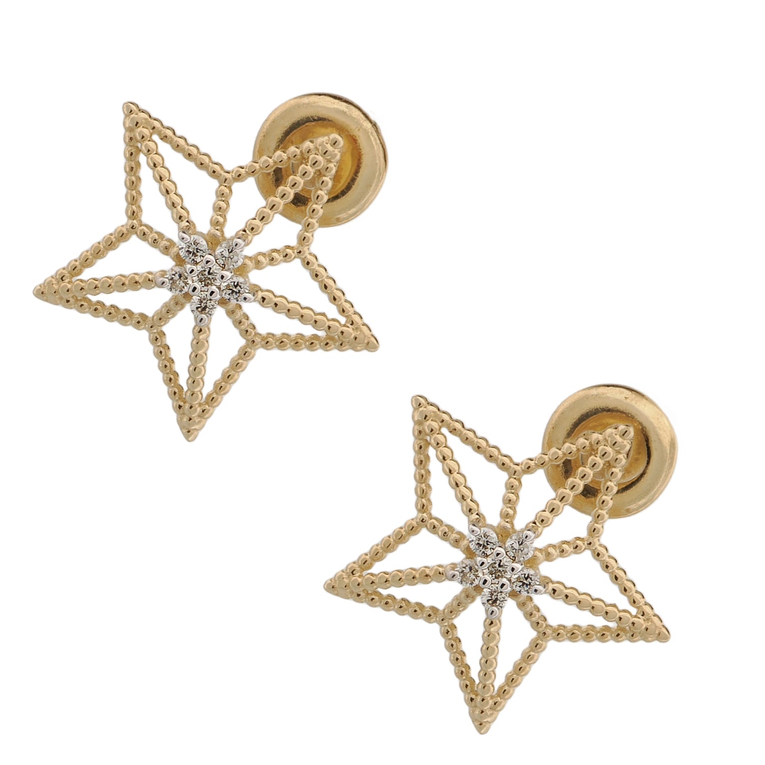 Delicate gold star earrings featuring sparkling VS1 clarity diamonds, inspired by celestial energy