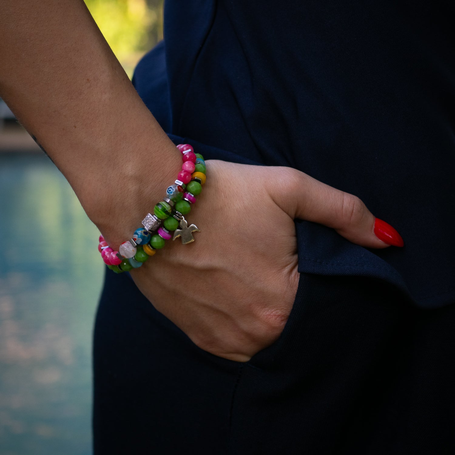 Handmade spiritual bracelet set featuring sterling silver angel charm and freshwater pearls