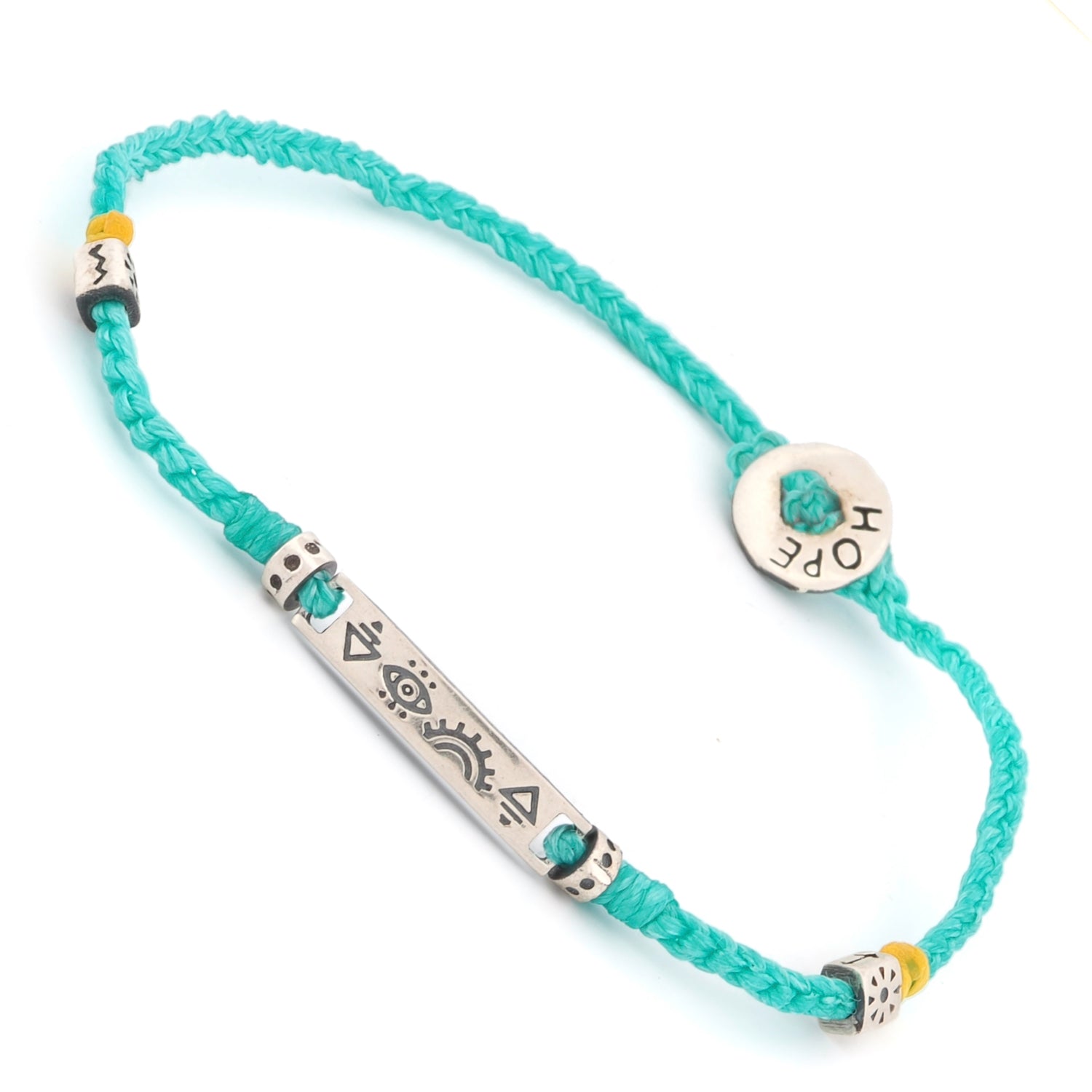 Statement turquoise woven bracelet with silver spiritual symbols and a "Hope" connector clasp.