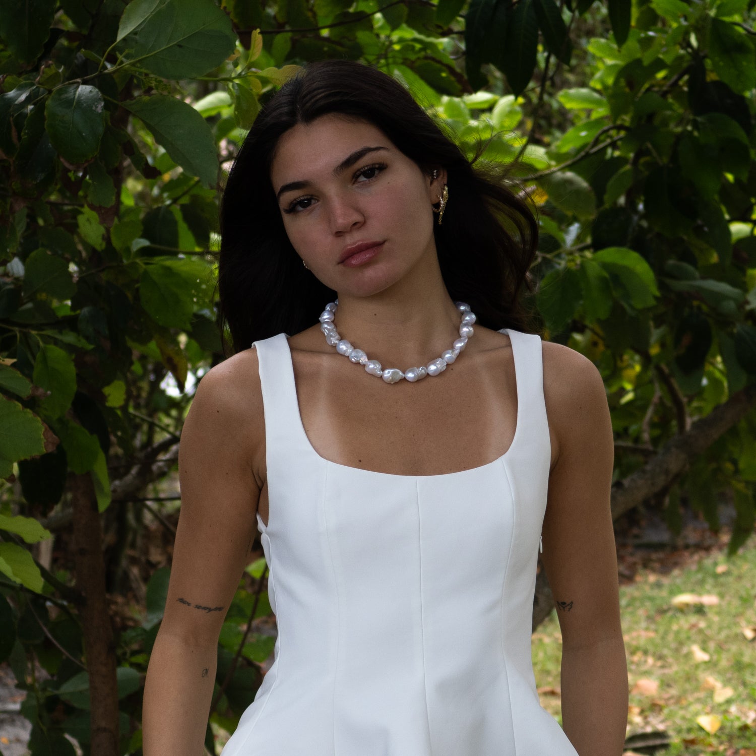 Hand-strung necklace featuring large baroque pearls with unique shapes and organic glow