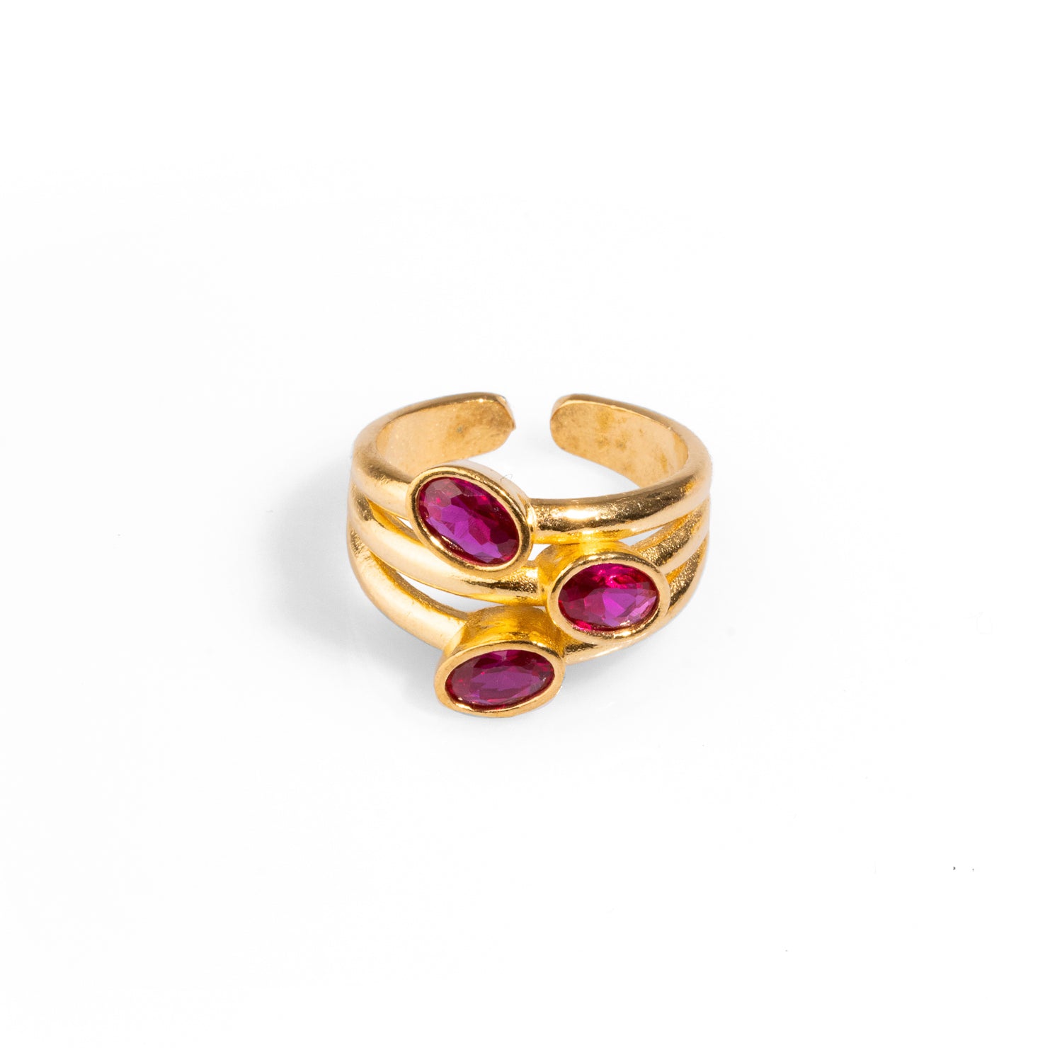 Timeless adjustable cocktail ring adorned with three oval rubies and a 24k gold-plated finish, perfect for any occasion.