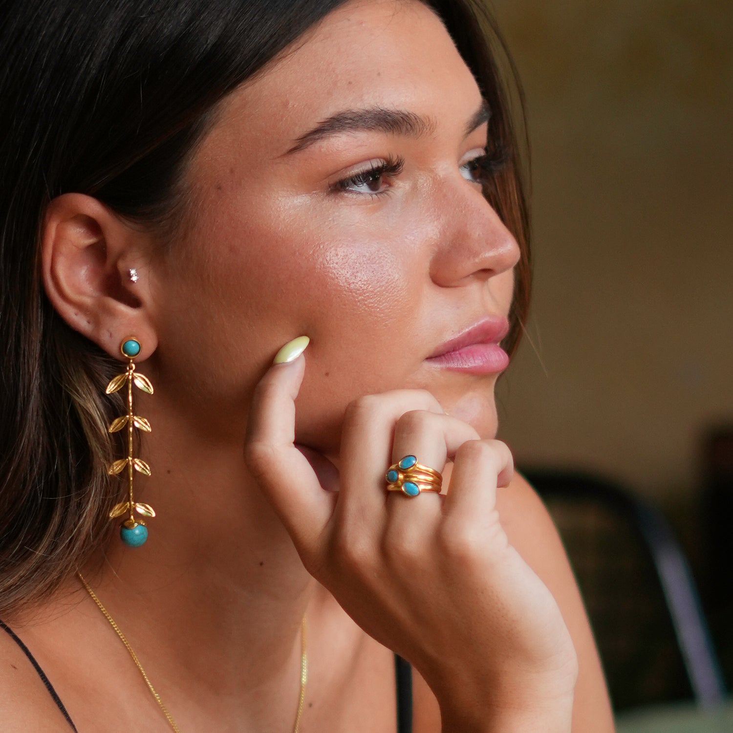 Luxurious trio turquoise gemstone ring with a 24k gold-plated base, offering a vibrant pop of color and adjustable sizing.