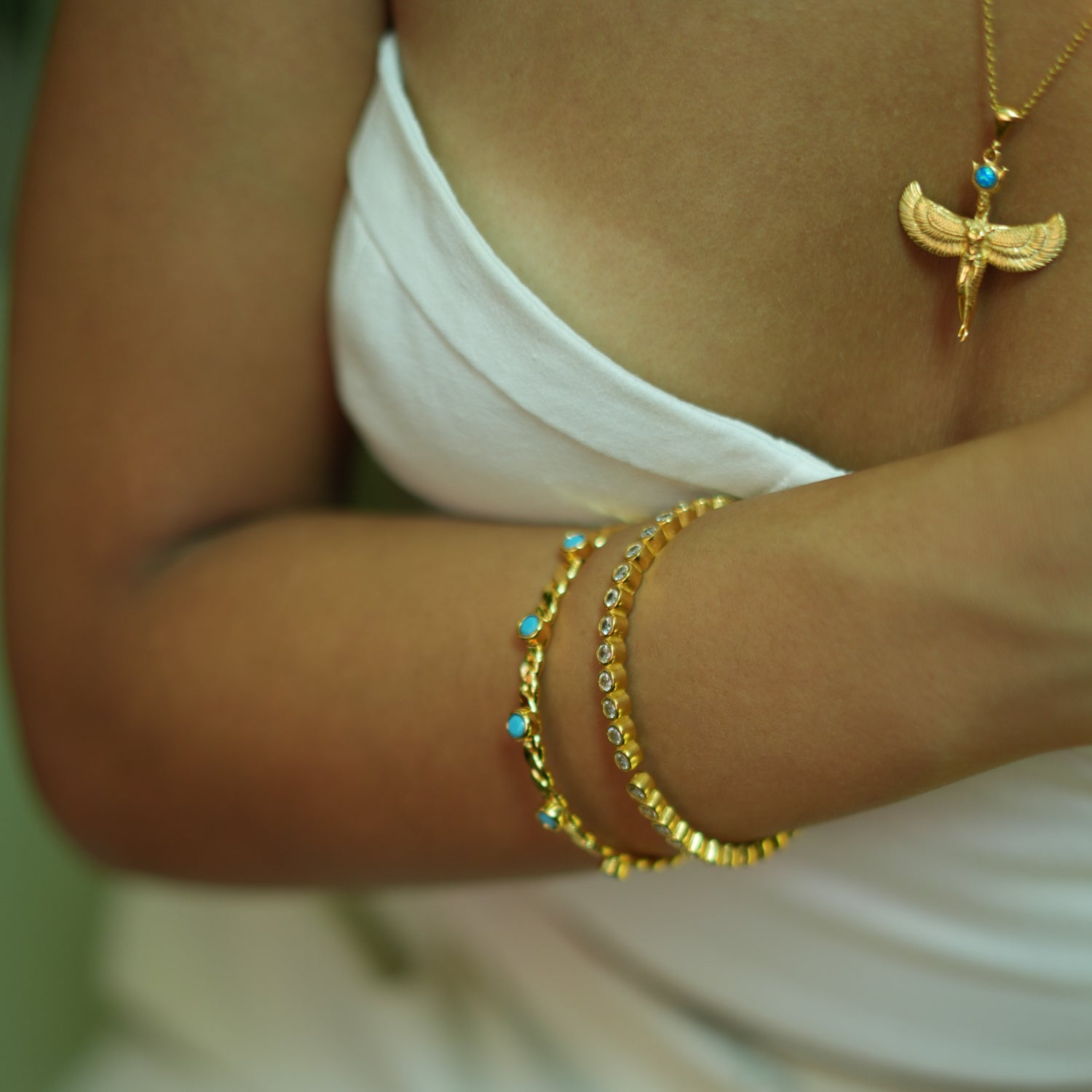 Gold Cuff Bracelet with Twisted Design and Turquoise Stones for Timeless, Understated Style