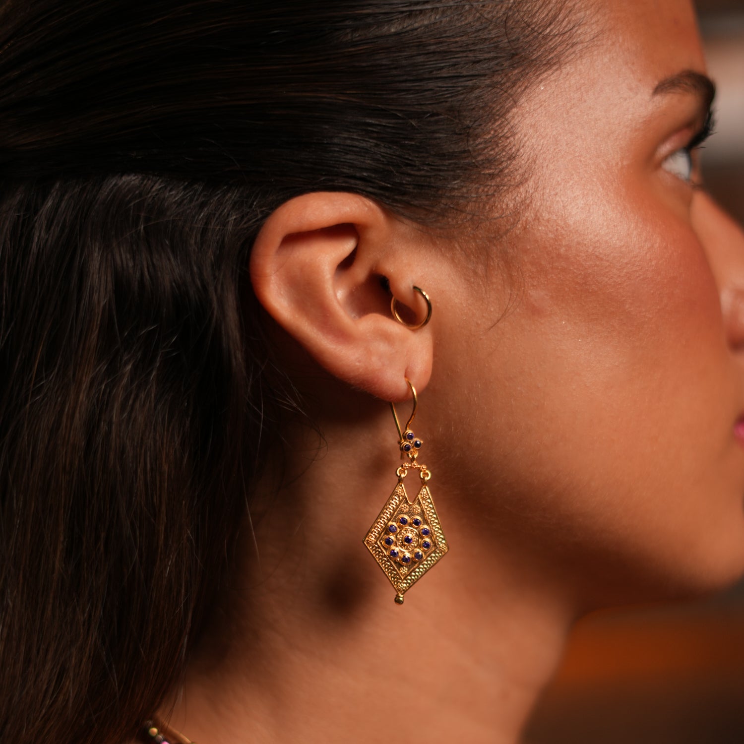 Handcrafted Gold Dangle Earrings with Amethyst Stones for a Unique and Elegant Style