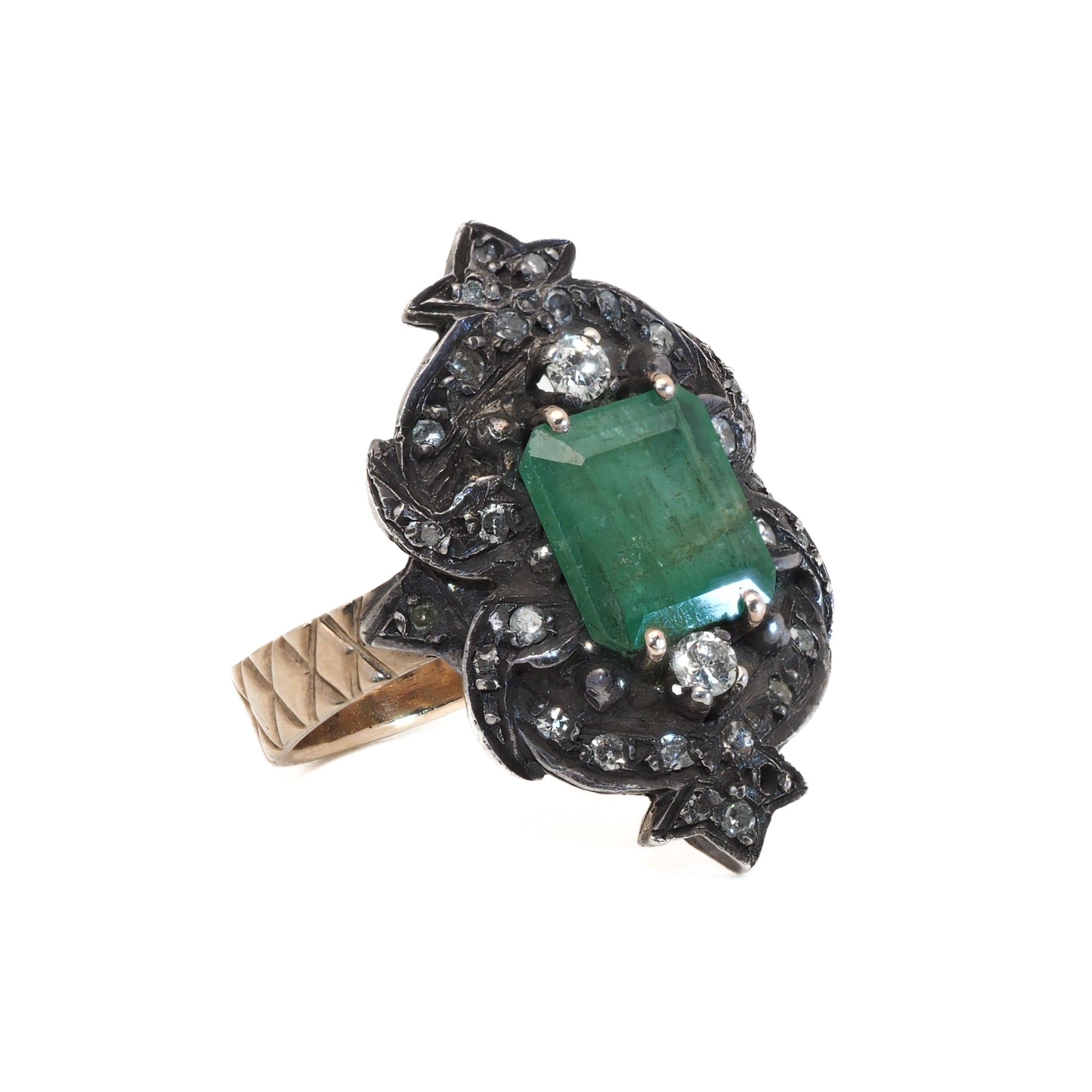 the Emerald Vintage Ring - A beautiful combination of emerald and diamonds, representing love and fidelity, handcrafted to perfection for a unique and meaningful piece of jewelry.