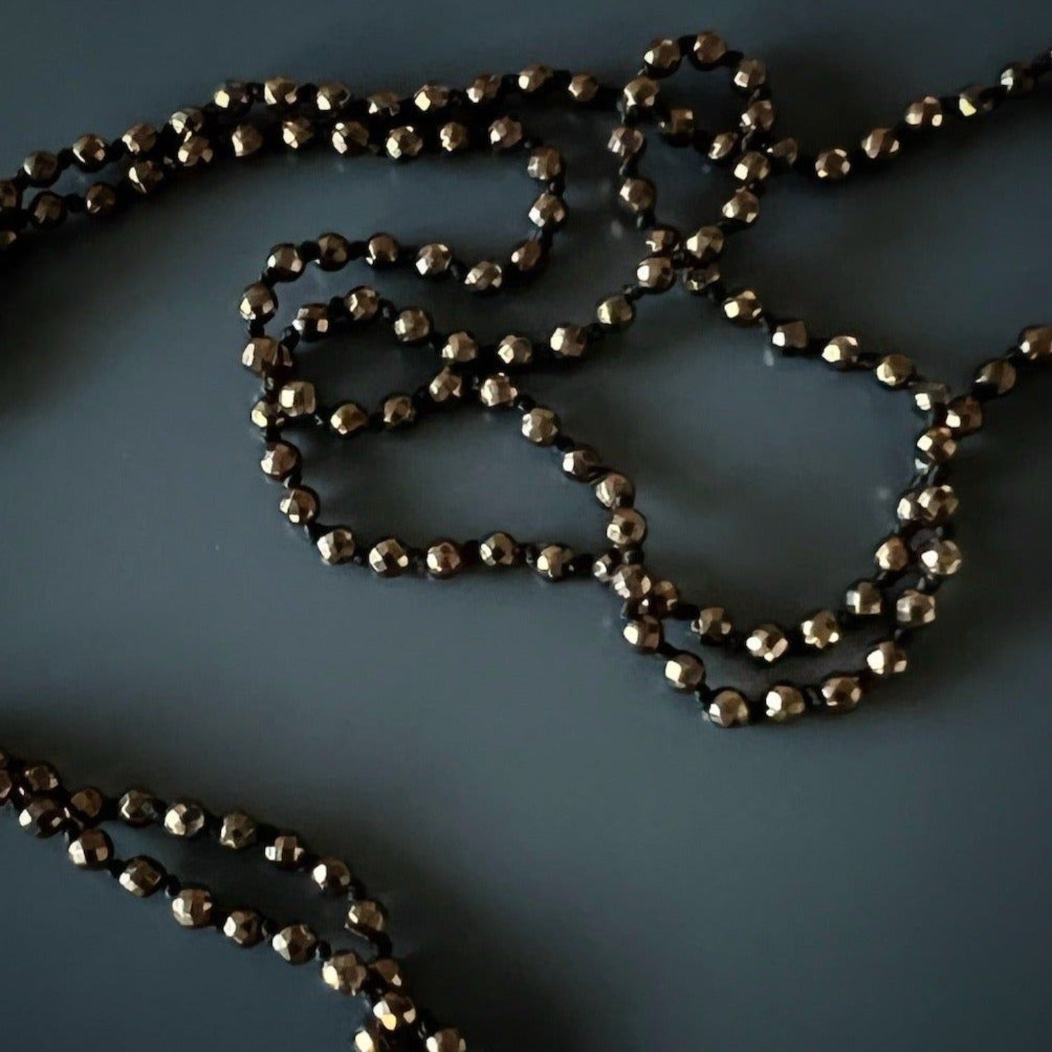 Artisan-crafted gladiator necklace with brown hematite stones and intricate silver pendant.