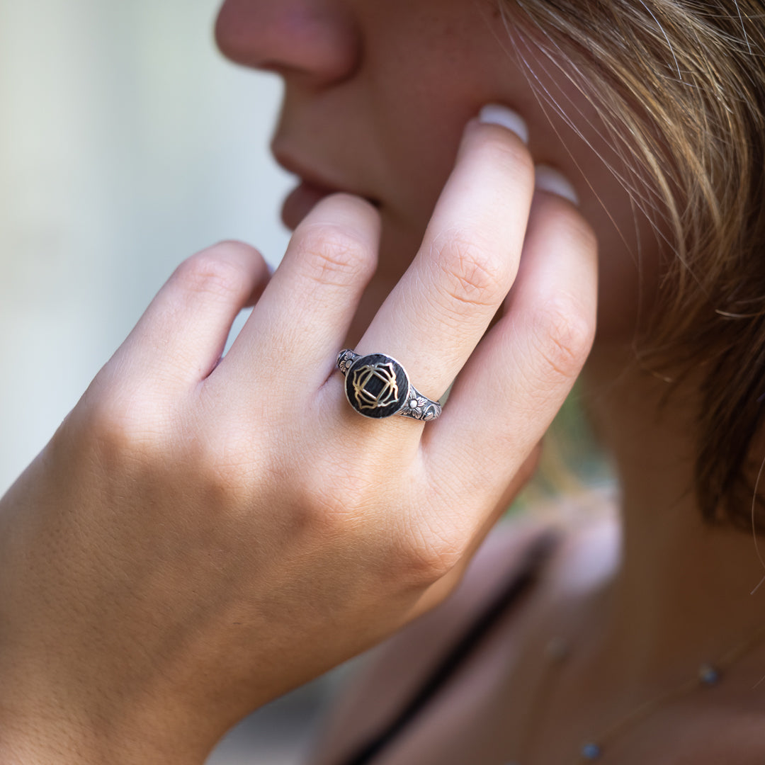 Model wearing the exquisite Chakra Ring, a statement of sustainability and style.