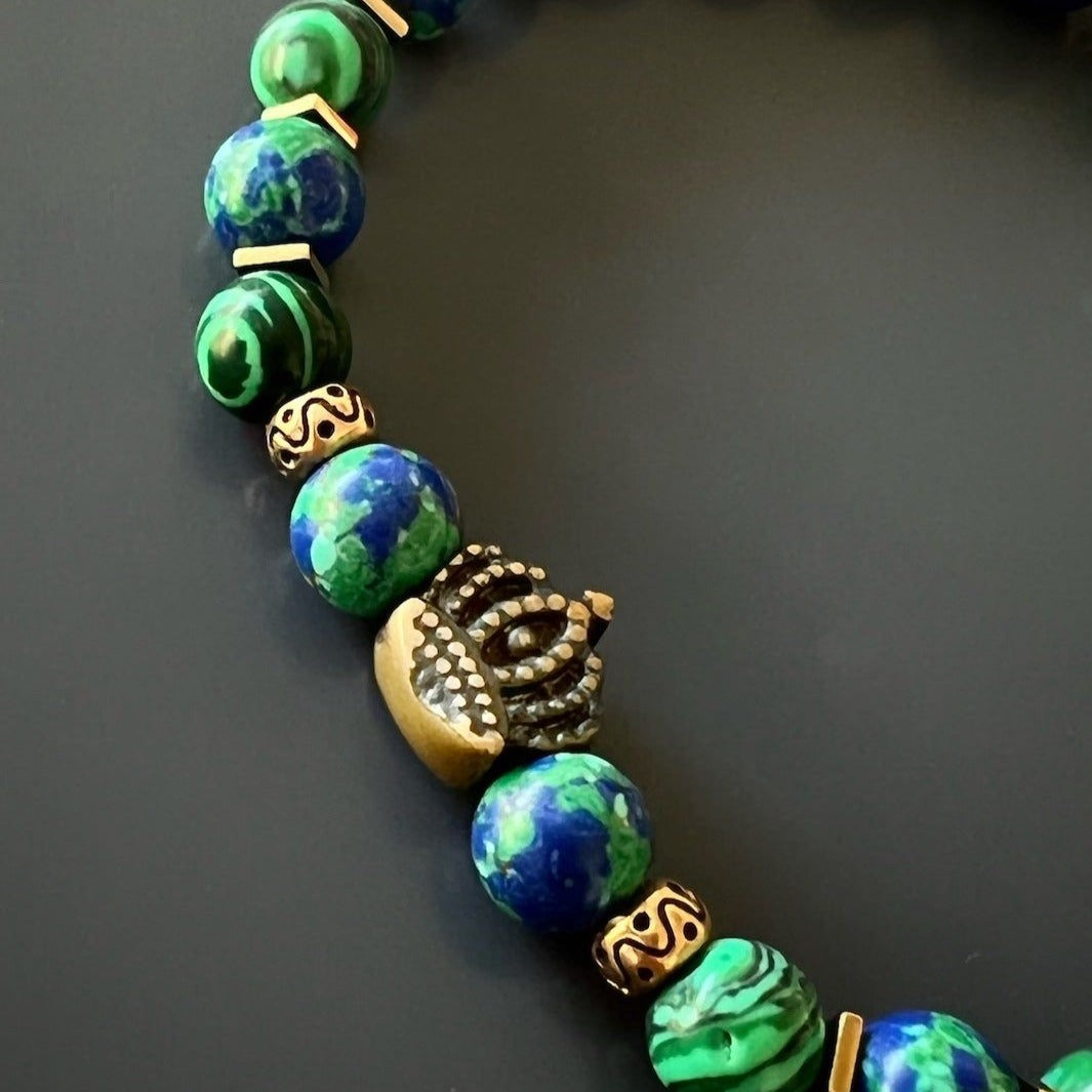 Green Malachite stones clear the chakras and promote balance